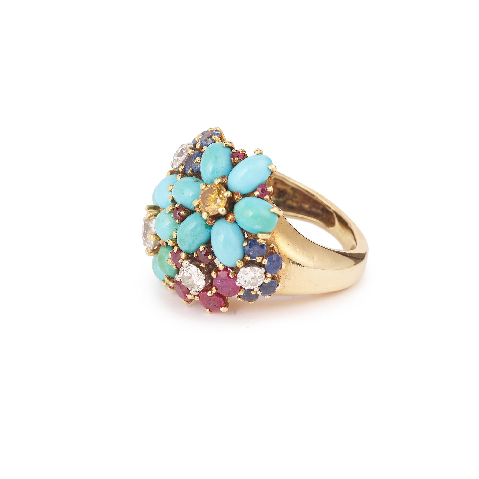 Retro ring set with 12 cabochon turquoise, 8 sapphires, 12 round and brilliant cut burmese rubies, and 6 brilliant old cut diamonds, one of which is yellow. 
Burmese rubies, most of them unheated. 

Ring size : 23.10 x 25.46 x 10.52 mm, (0.909 x