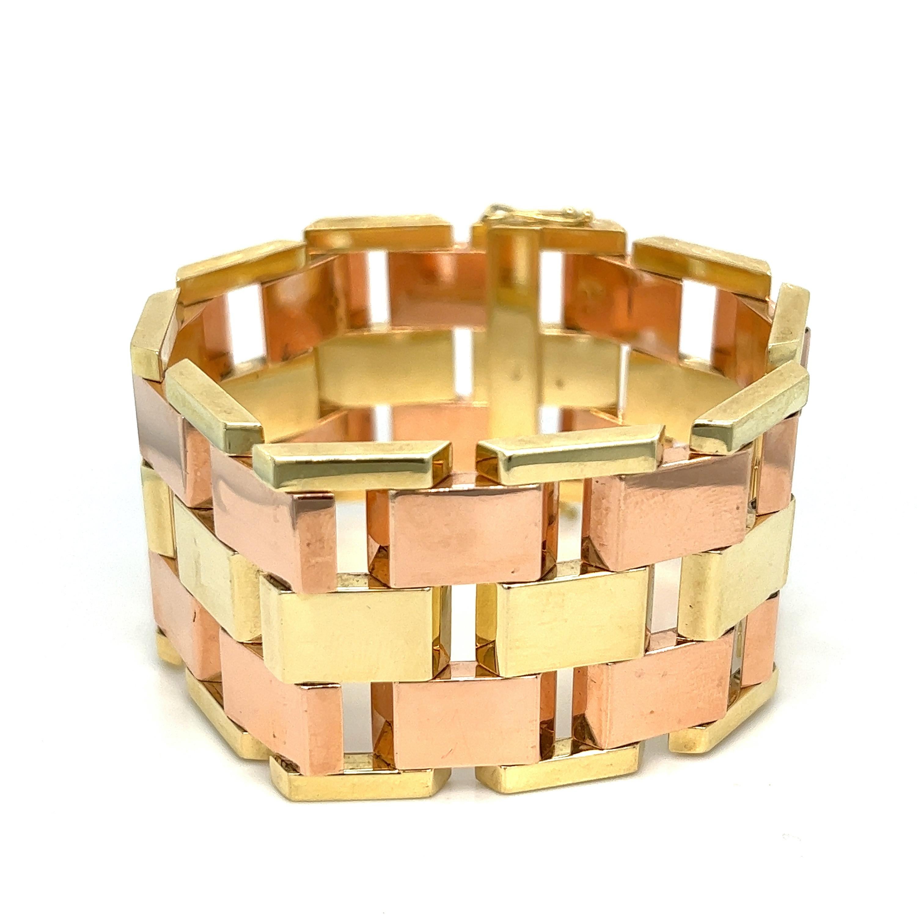 Retro two-color gold bracelets, Austria

Wide strap bracelet of geometric links, can be combined to form a necklace, 14 karat yellow gold; Austrian hallmarks 

Size: width 0.31 inch, length 8 inches each
Total weight: 111.4 grams