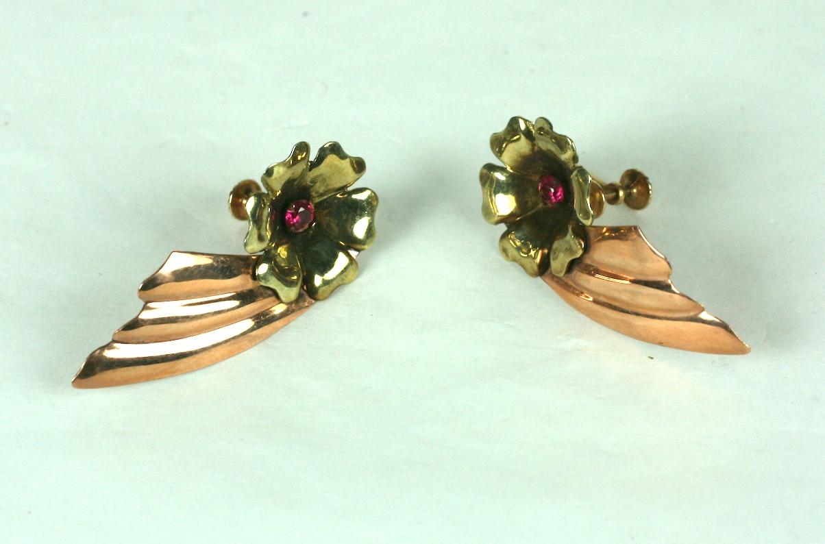 Retro 2 Toned Wing Earrings in 14k pink and green gold with ruby glass accents. The flowerhead is made of 14k green gold and the wing is of 14k pink gold.  Screw back fittings.  Light and wearable on the ear.
1.5