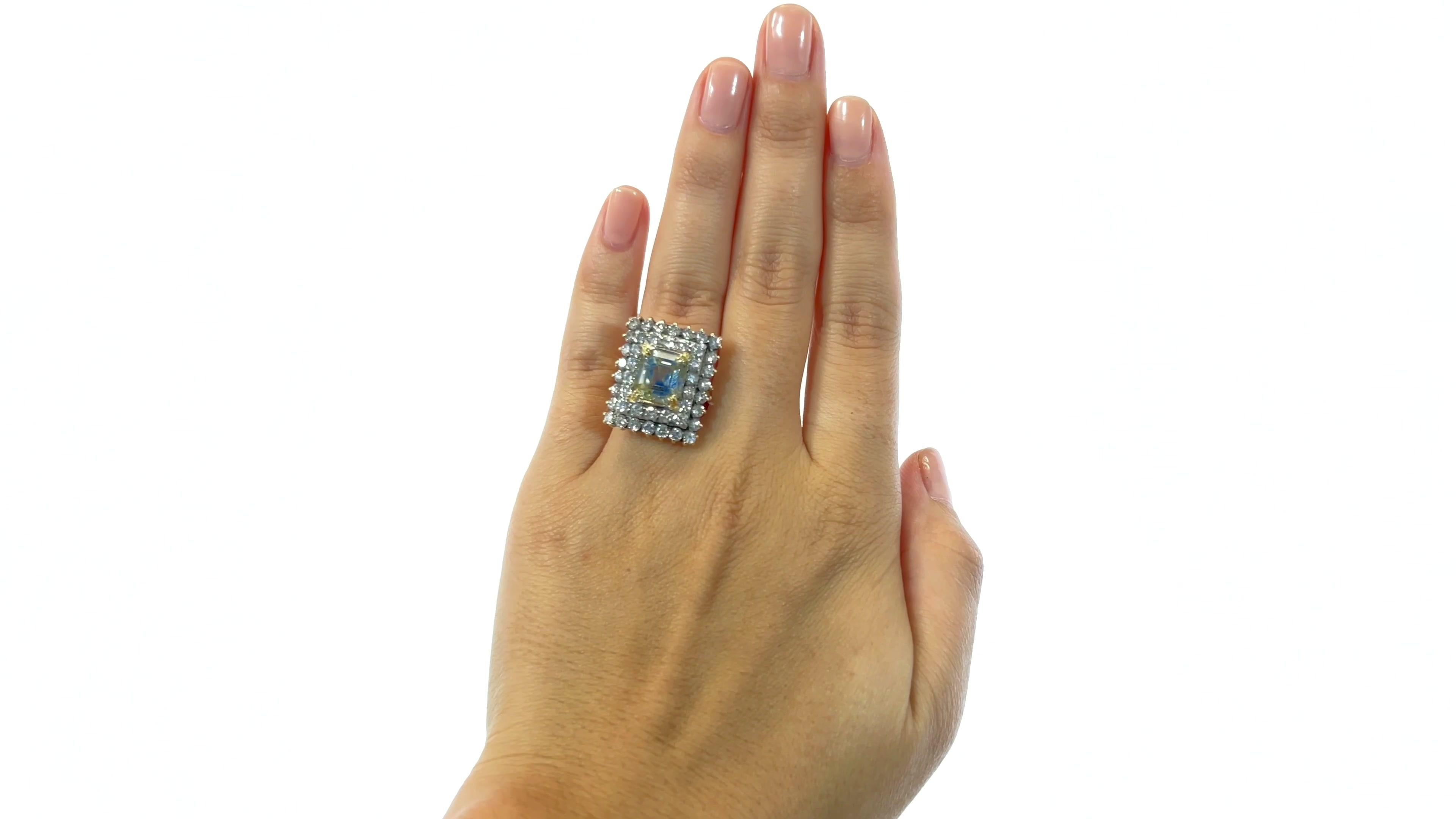 Retro Victorian Revival 6.64 Carat Emerald Cut Yellow Sapphire Diamond Gold Ring. Featuring 44 round brilliant diamonds  diamond approximately 1.76 carats F-G color, VS clarity. Yellow gold and silver top. Circa 1940s.

About the piece: How often do