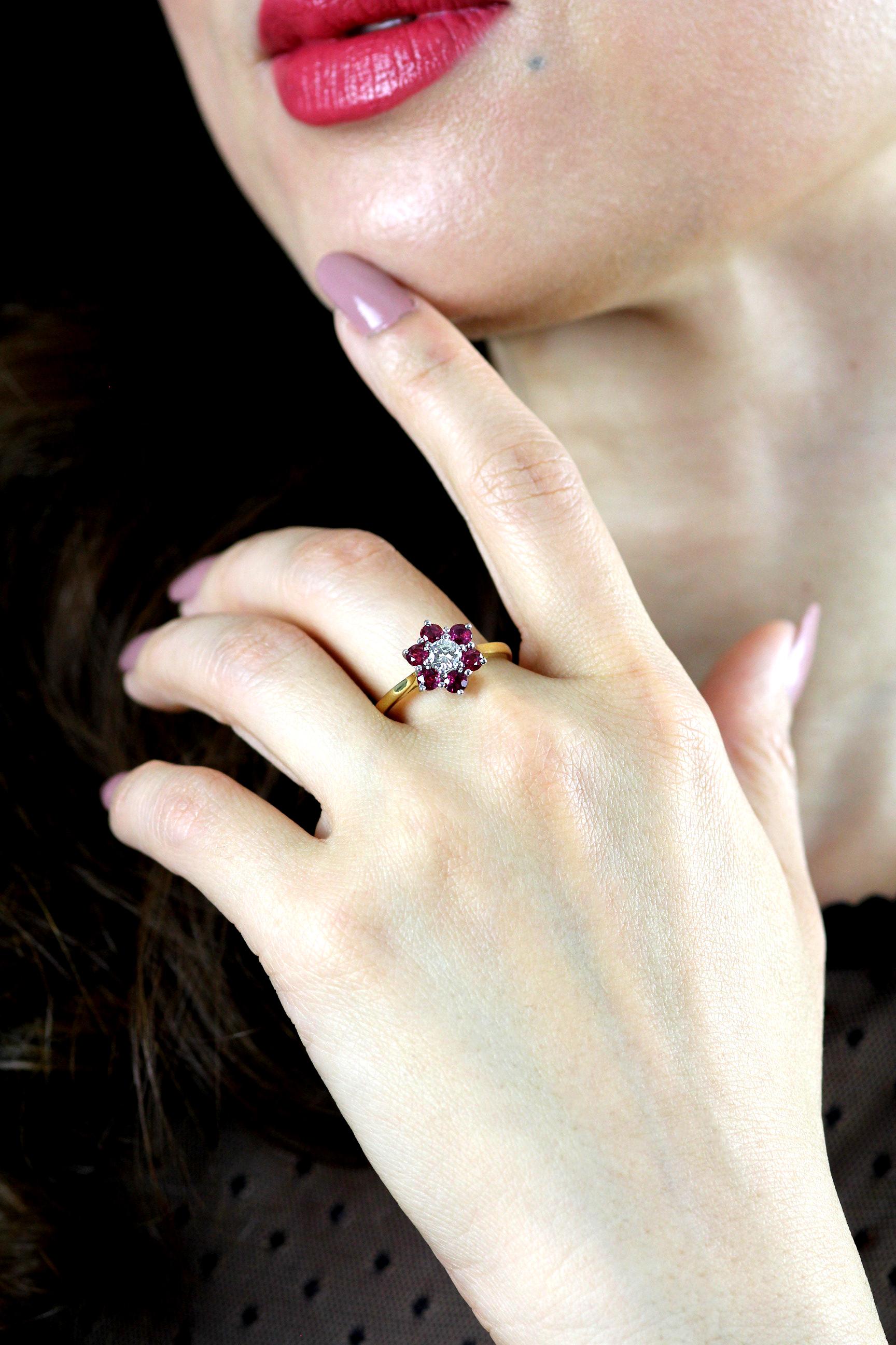 Red ruby flower cluster genuine retro ring, hallmarked London 1976.
Let the fashionista in you bloom this summer and step out in style and in fantastic colour!
These exquisite quality rubies blaze red in contrast to the cool white brilliant diamond,