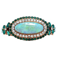 Bracelet jonc rétro vintage en or rose 14 carats avec opale, diamants et émeraudes et halo