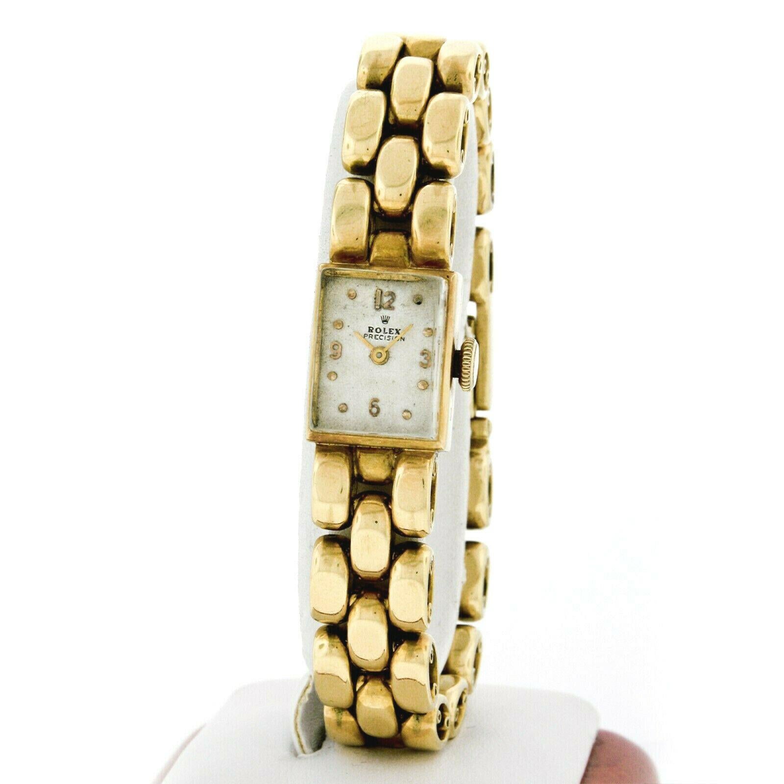 Here we have a gorgeous vintage ladies' Rolex wrist watch/bracelet. The watch case and bracelet are 100% original to the piece and are well crafted in solid 18k yellow gold. The mechanical, 17 jewel, hand-wound movement keeps perfect time and the