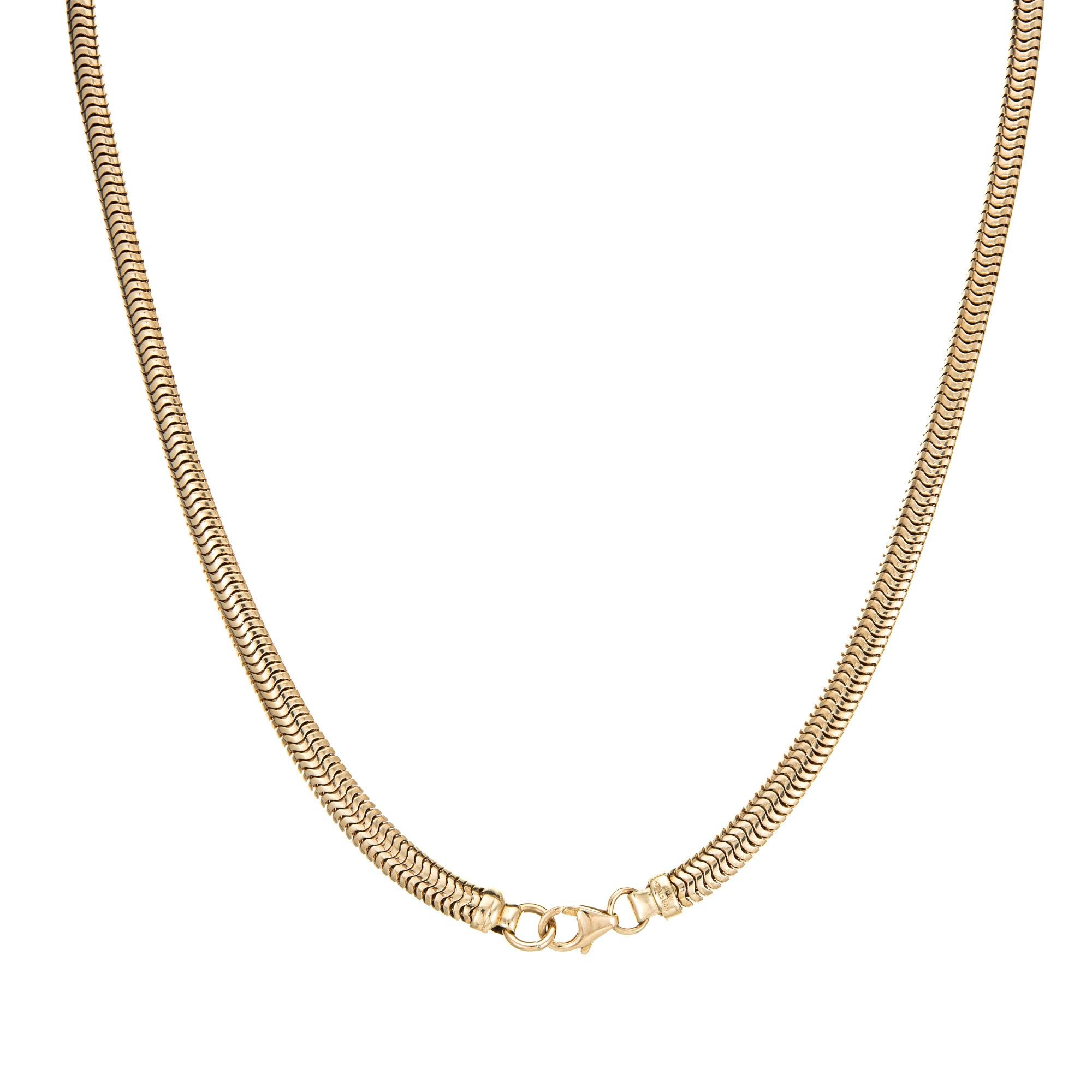 Stylish retro vintage snake chain crafted in 10 karat yellow gold (circa 1940s to 1950s). 

The stylish snake chain is supple to the touch and moves easily. Measuring 5mm wide the chain makes a nice statement and sits at the nape of the neck. The