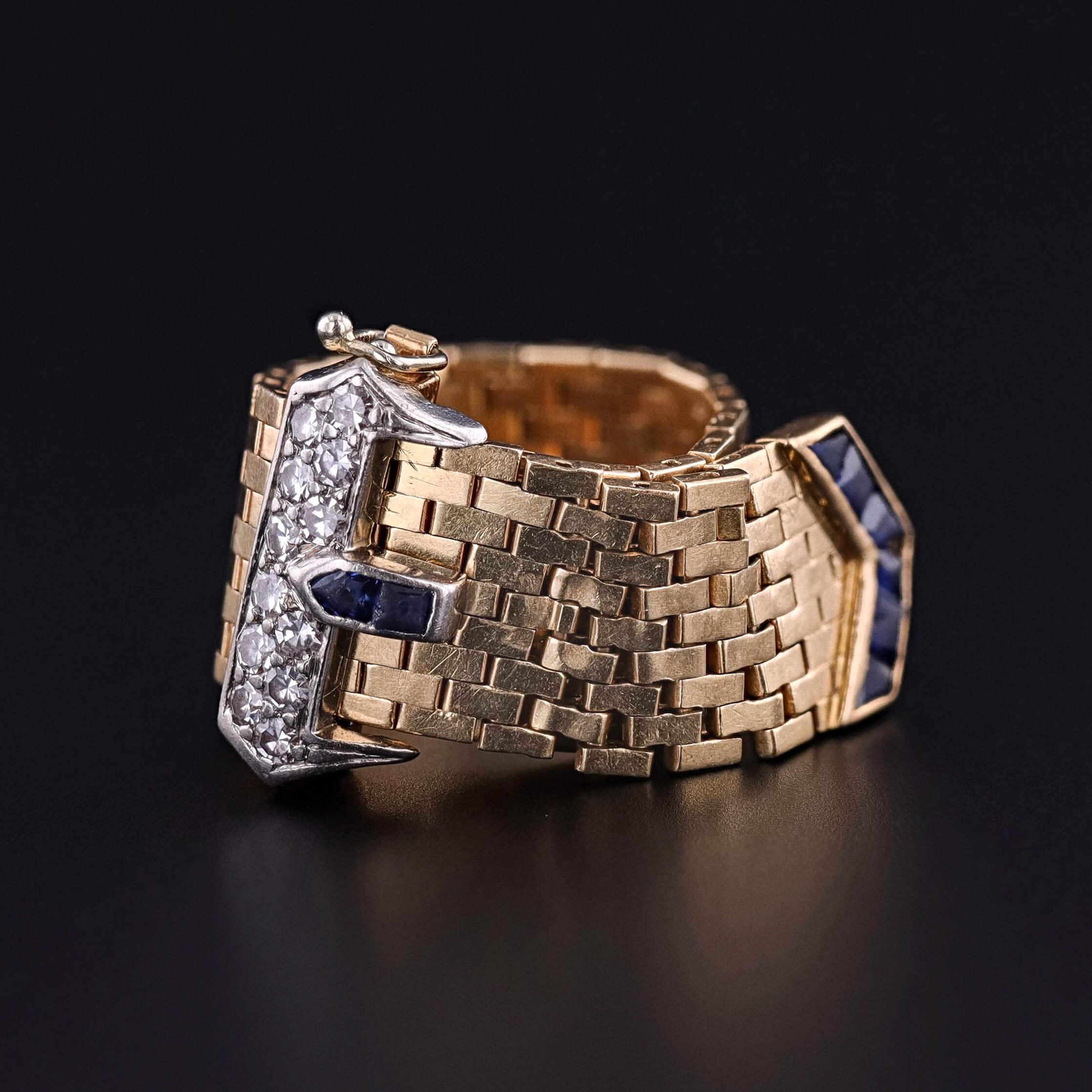 A refined and historically significant jewel, this 1940s Tiffany & Co. belt ring is an exquisite example of wartime-era craftsmanship. Rendered in solid 14k gold and accented with palladium–ruthenium—metals employed during World War II when platinum