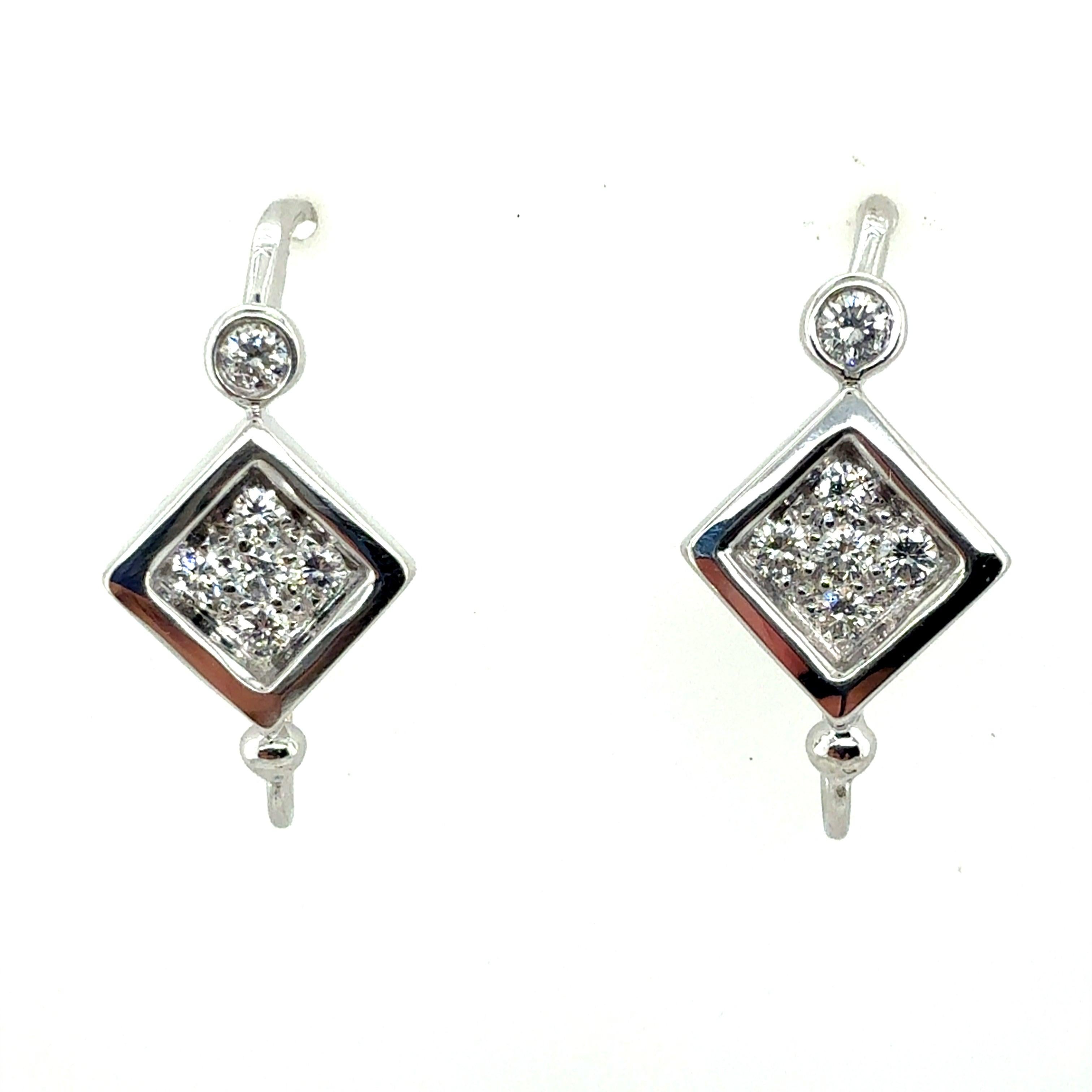 Round Cut Retro White Gold 0.6 Carat Natural Colorless Diamond Earrings, Circa 1980 For Sale