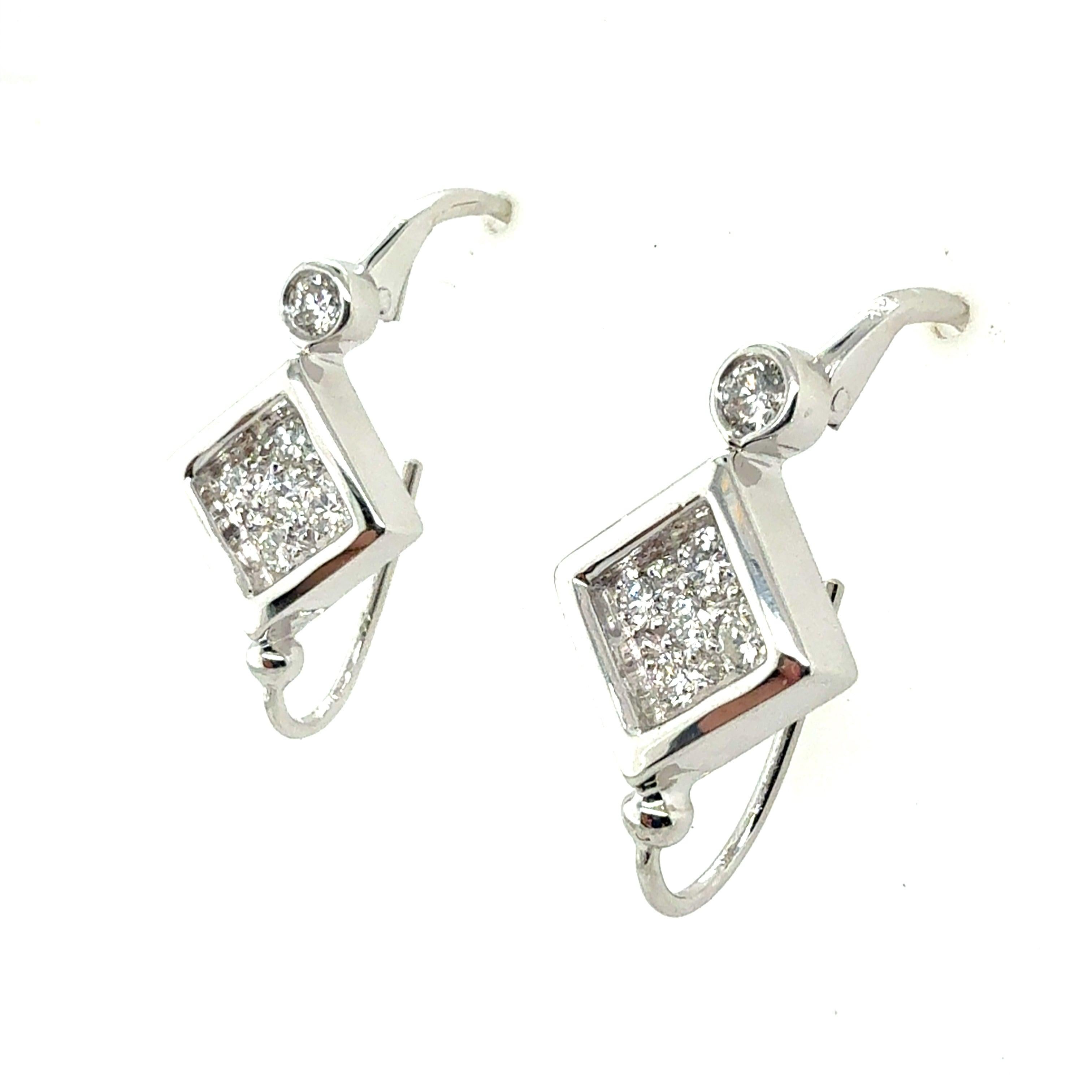 Retro White Gold 0.6 Carat Natural Colorless Diamond Earrings, Circa 1980 In Good Condition For Sale In Los Angeles, CA