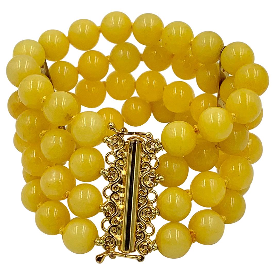 Bracelet rétro à 4 brins de perles en calcédoine jaune