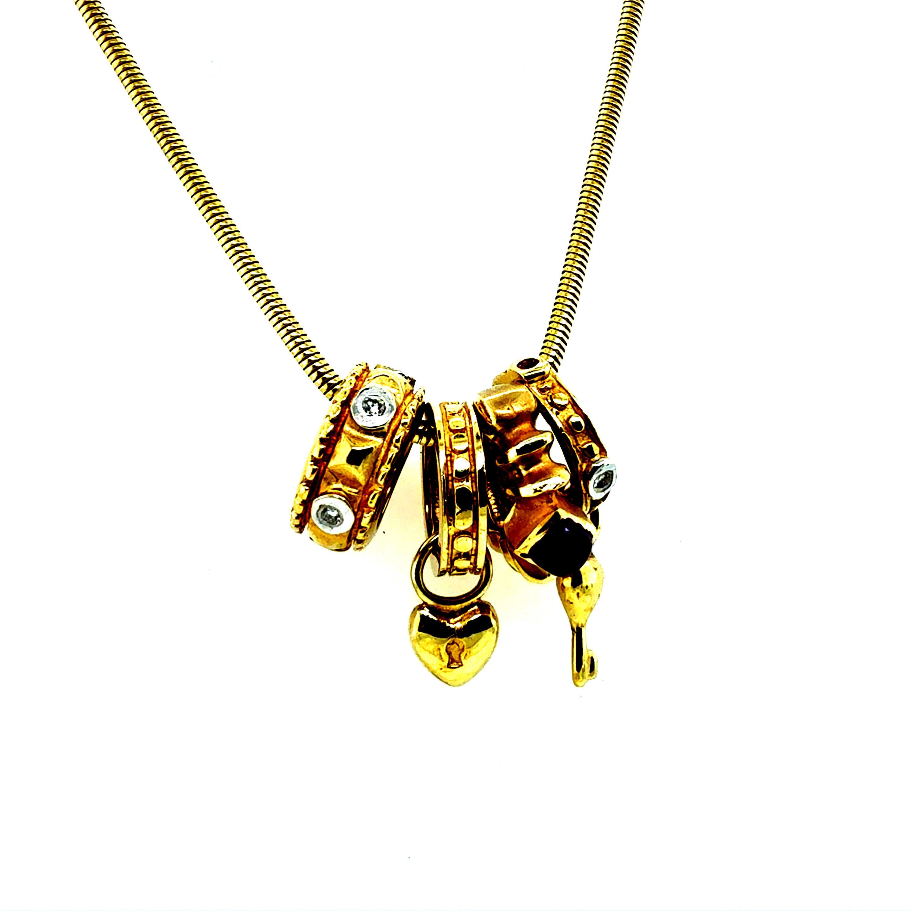 Women's Retro Yellow Gold Designer Gemstone Charm Statement Necklace Circa 1980 For Sale