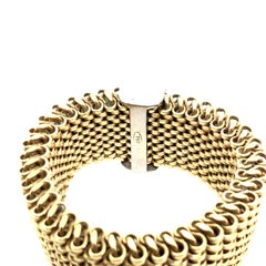 Anillo retro de oro amarillo con banda flexible y diamantes naturales, de alrededor de 1980