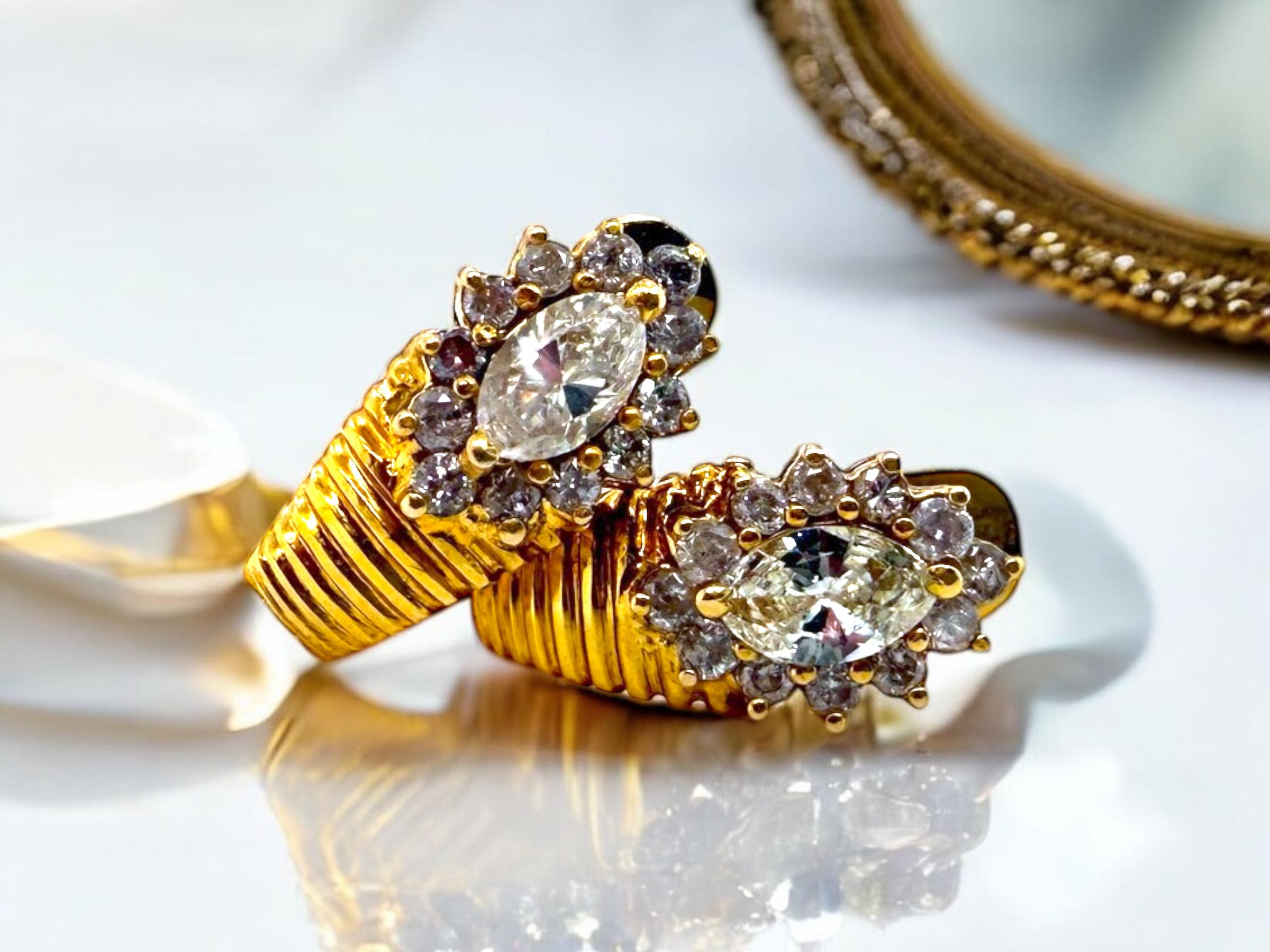 These vintage earrings are so unique!!!
The perfect simple statement piece.

Earring Details
Material: 14K Yellow Gold
Drop Length: 3/4 Inch
Width: 3/8 Inch
Weight: 5.3 Grams
Back Type: Posts & French Backs

Accented by the following gemstones
2 -