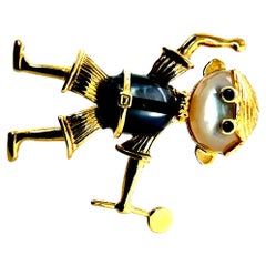 Retro Yellow Gold Tennis Boy Pendant and Brooch Circa 1990