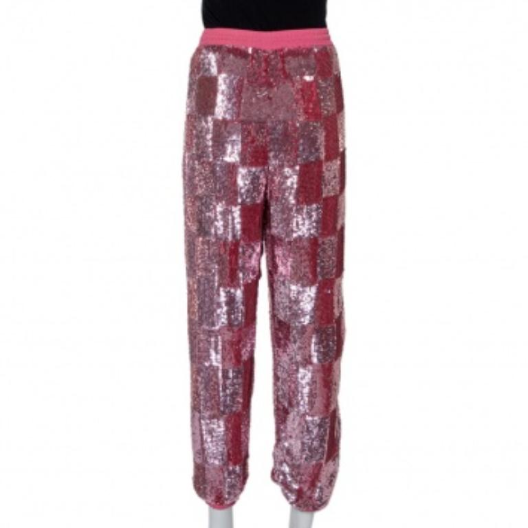 Get a statement look with these joggers from Retrofete. Designed with sequins laid in a check pattern, the joggers bring glamour to a casual style staple. The pair in pink is complete with a comfortable waistband.