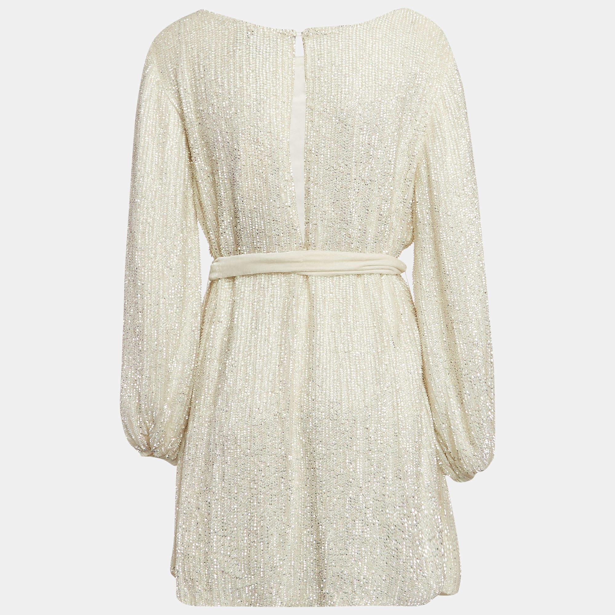 This designer dress is a chic and stylish garment that exudes elegance and sophistication. With its sleek design flattering silhouette and high quality craftsmanship this dress is perfect for any special occasion or evening event ensuring you stand