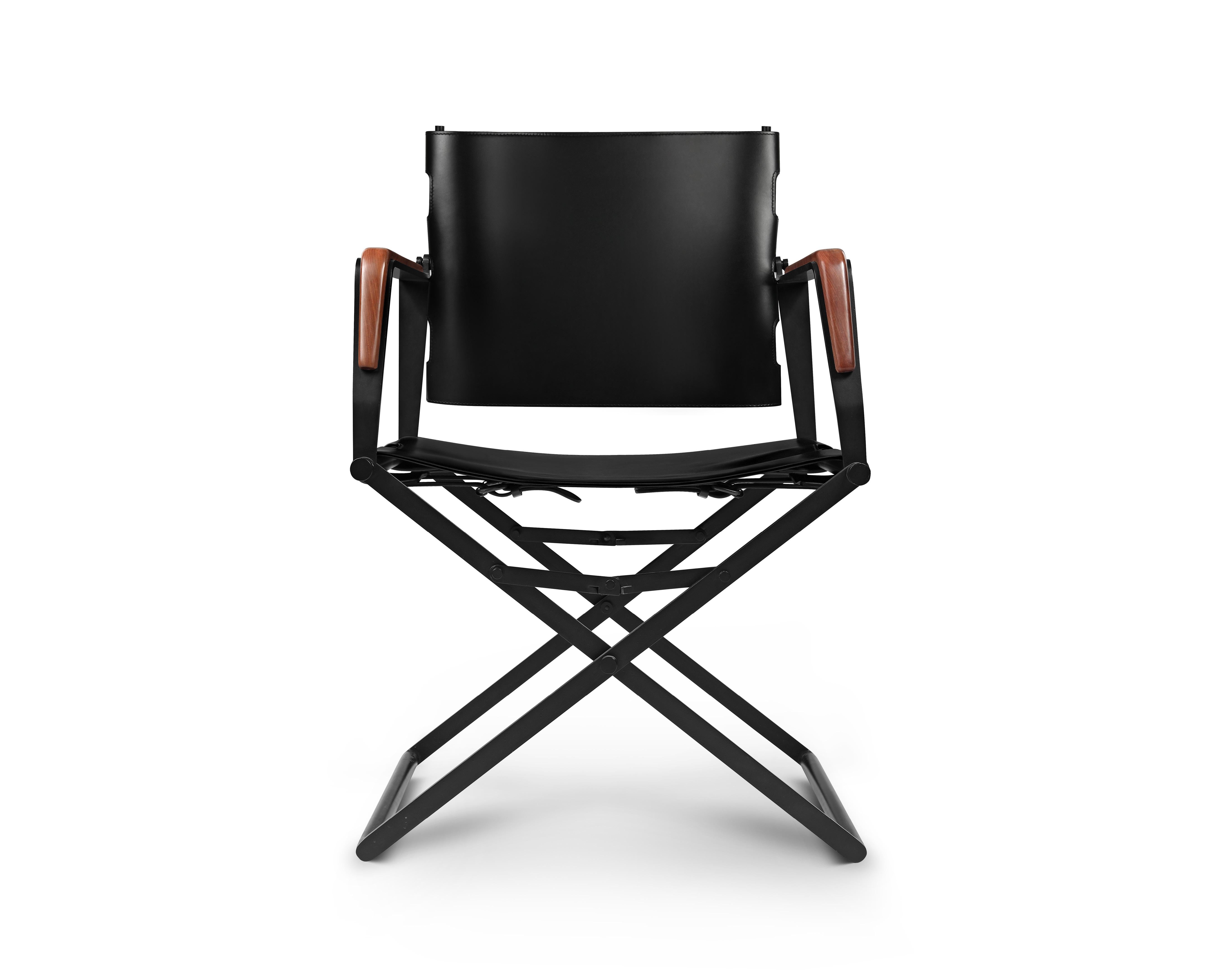 Retta armchair with leather and wood by Madheke
Dimensions: W 58.7 x D 56.2 x H 89.5 cm
Materials: leather, wood, metal

The RETTA consists of a folding frame paying tribute to the classic American style director's chair from the golden Hollywood
