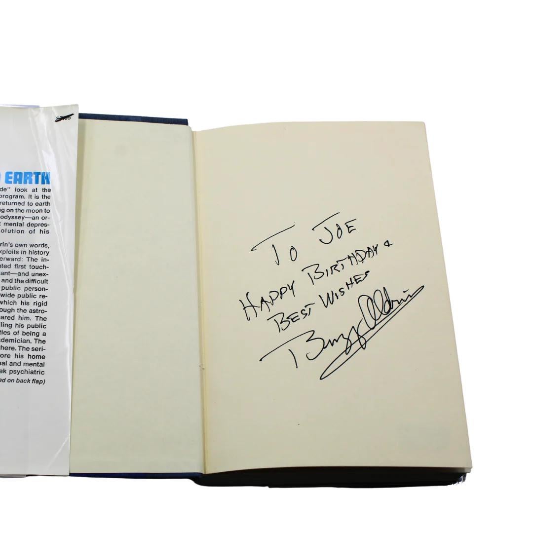 Aldrin, Edwin, Warga, Wayne, Return to Earth. New York: Random House, 1973. First Edition. Signed and inscribed by Buzz Aldrin on front endpage. In original cloth boards and unclipped dust jacket. Illustrated. 

Presented is a signed first edition