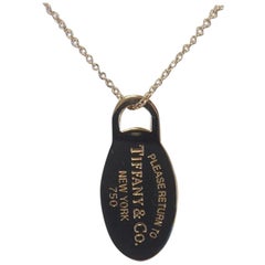 Vintage Return to Tiffany & Co. 18 Karat Yellow Gold Oval Dog Tag Necklace