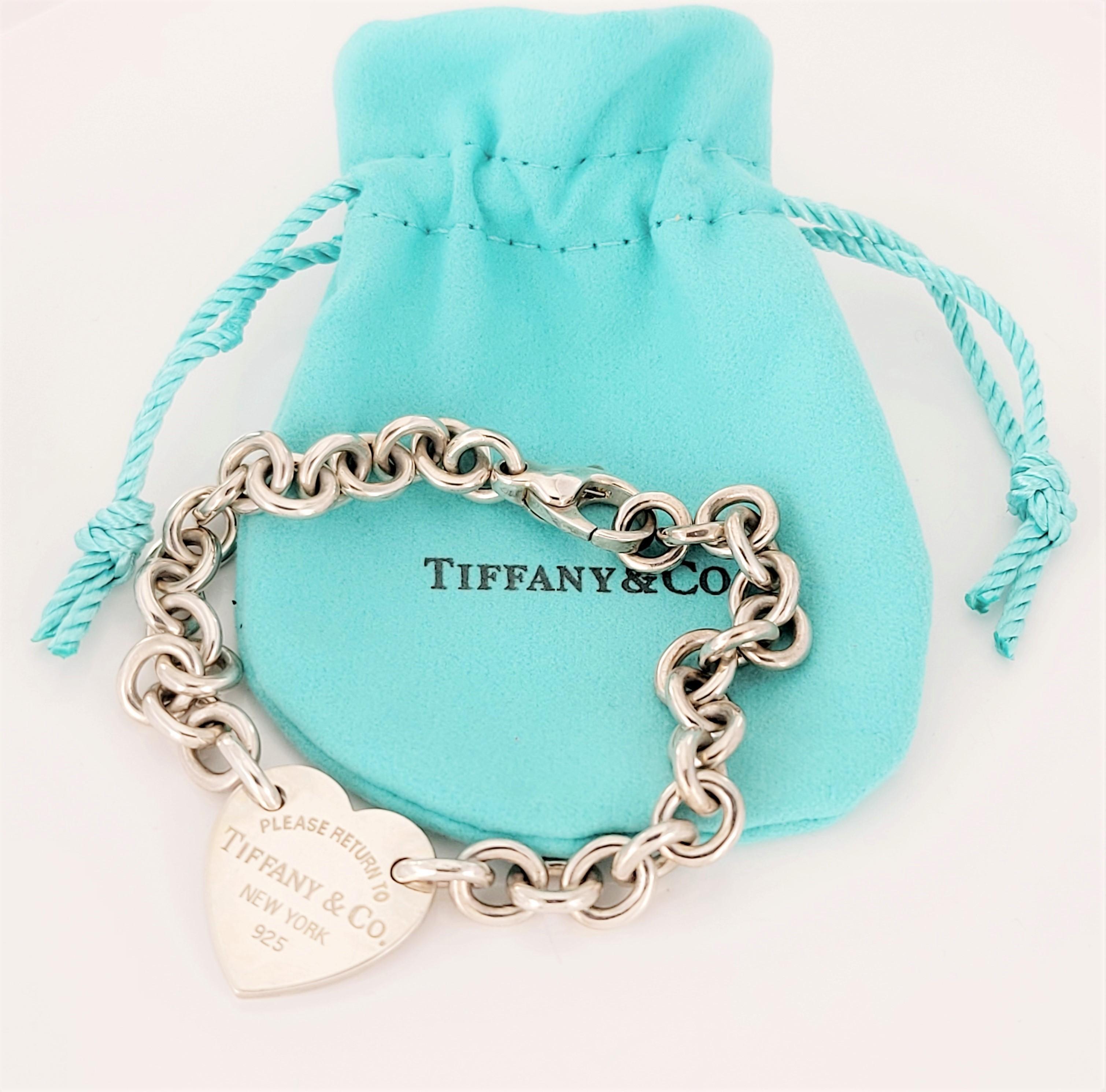 Women's Return to Tiffany & co  Heart Tag Charm Bracelet in Silver For Sale