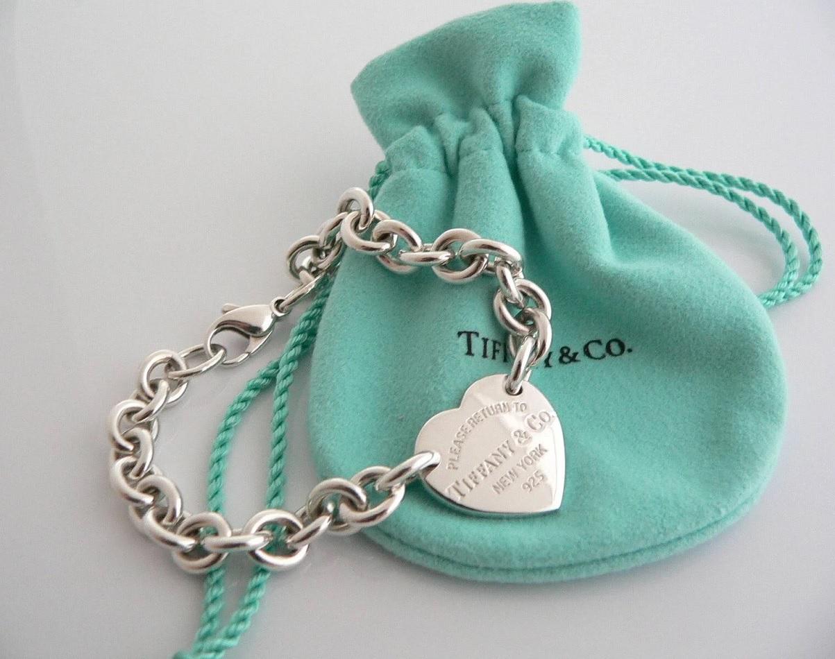 Return to Tiffany & co  Heart Tag Charm Bracelet in Silver For Sale 1