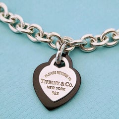 Return to Tiffany & Co. Sterling Silver Heart Tag Necklace with Black Onyx Heart