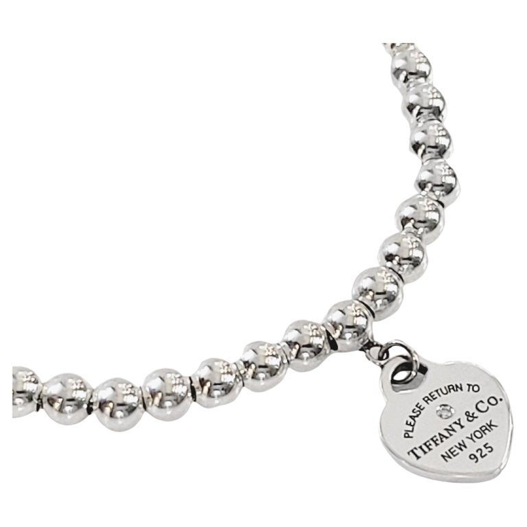 Return to Tiffany Heart Tag Bead Bracelet in Silver with a Diamond, 4 mm  For Sale at 1stDibs | tiffany bracelet, bracelet tiffany silver, henns  skull mounts