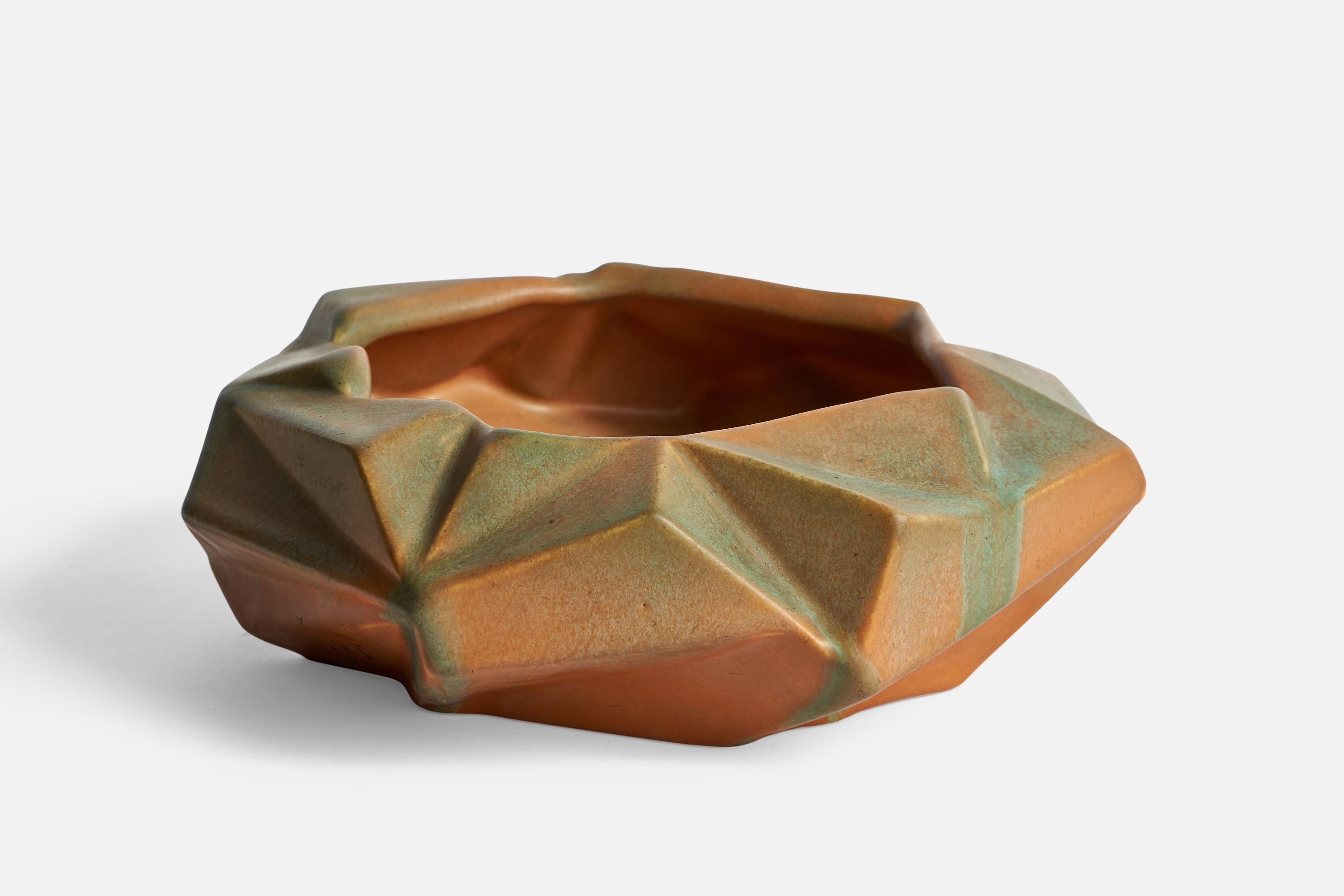 A freeform bowl designed by Reuben Haley and produced by Muncie Pottery, USA, 1930s.