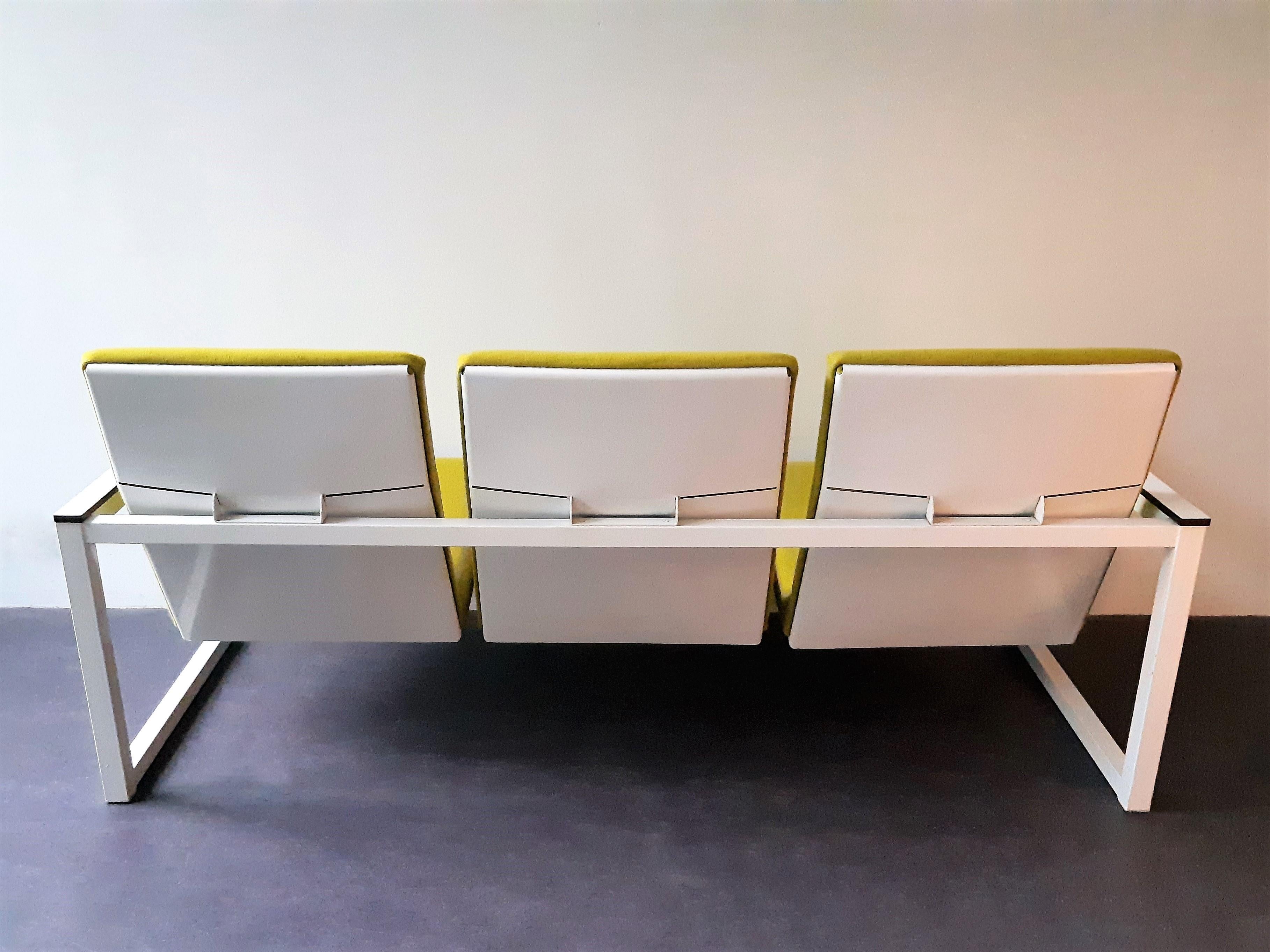 This rare 3-seater sofa is a combination of designs by Tjerk Reijenga and Friso Kramer, produced by Pilastro in 1965. The seat was designed by Friso Kramer for Ahrend de Cirkel 1959 and the sofa as it is was designed by Tjerk Reijenga for Pilastro
