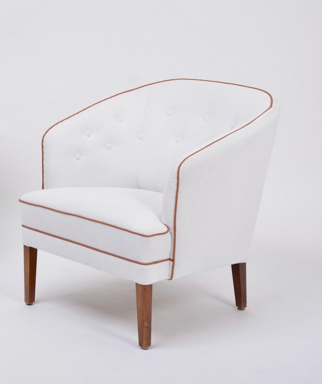 Rare armchair with elegant curves designed and produced by Danish master craftsman Ludvig Pontoppidan. The chairs are in excellent condition, as they have been re-upholstered.

When it came to Danish master craftsmen few if any, were better than