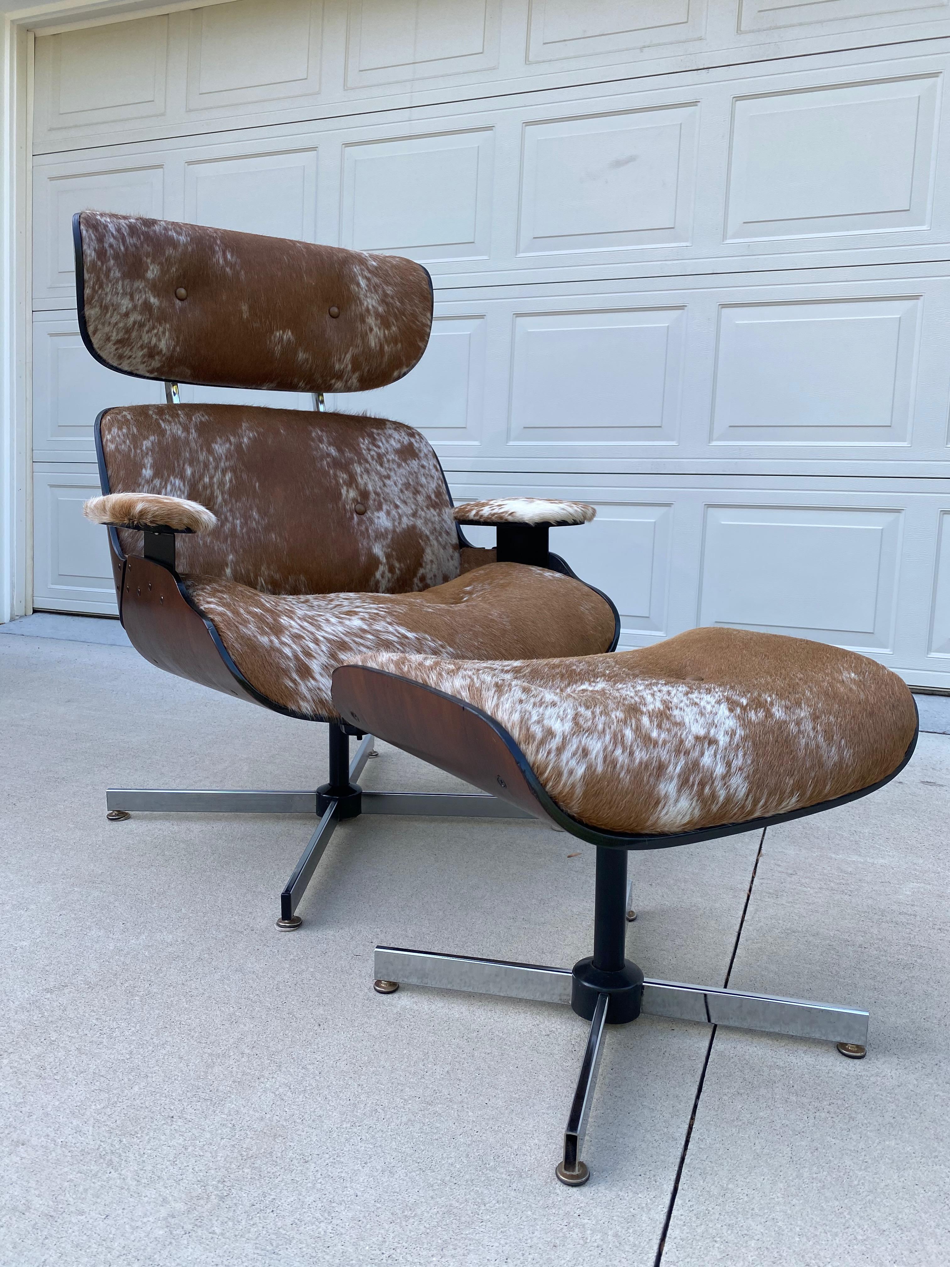 Mid-Century Modern Lounge Chair and ottoman set reupholstered in cowhide fabric. The laminate underneath the recliner and ottoman has been refinished as well. This set is in excellent condition (few minor imperfections, pictured above). Be the one