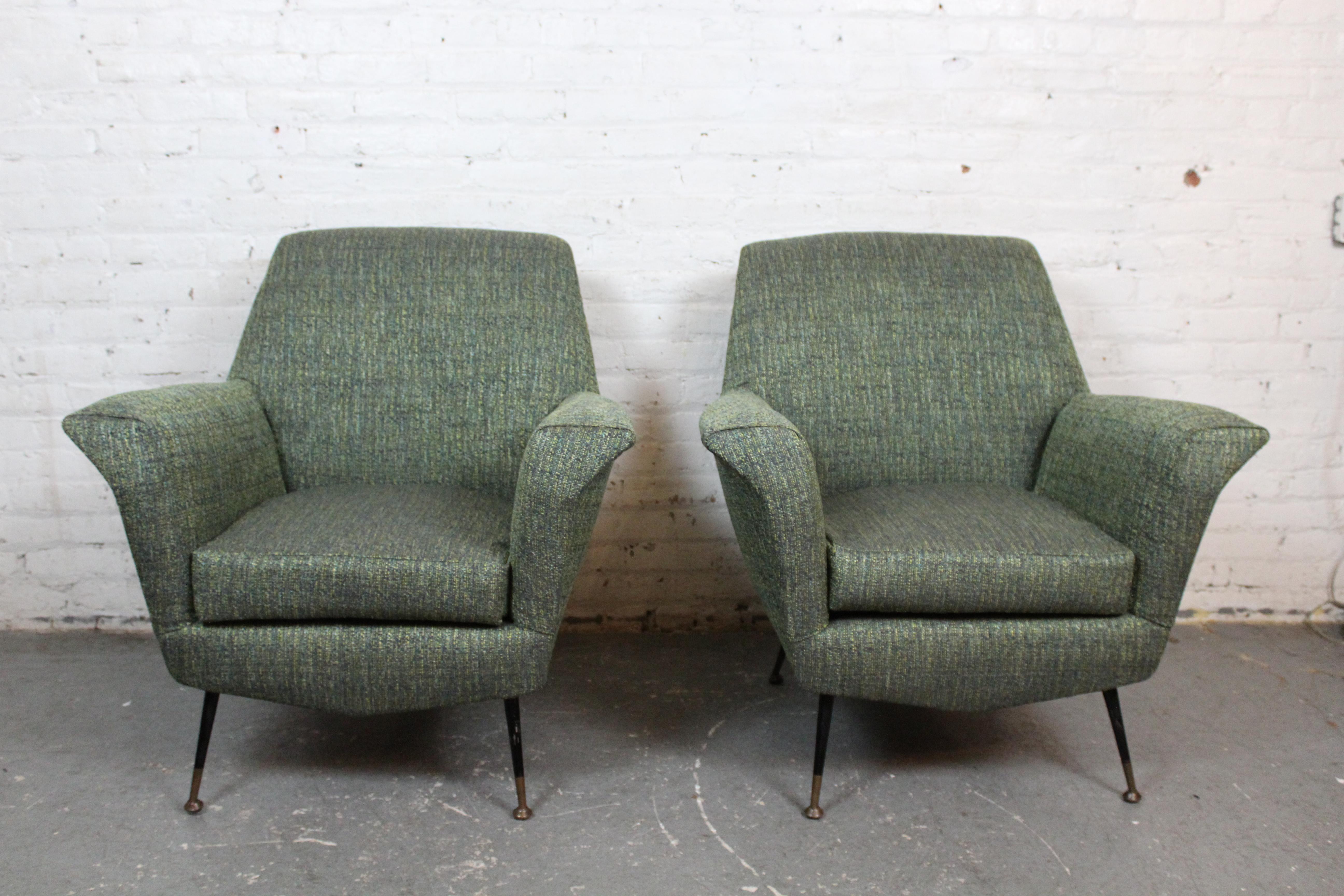 Add some genuine retro flair to your space with this absolutely funky pair of mid-century Italian lounge chairs. Produced by La Permanente Mobili in Cantù on the Italian-Swiss border, these overstuffed seats feature classic vintage Italian stylings