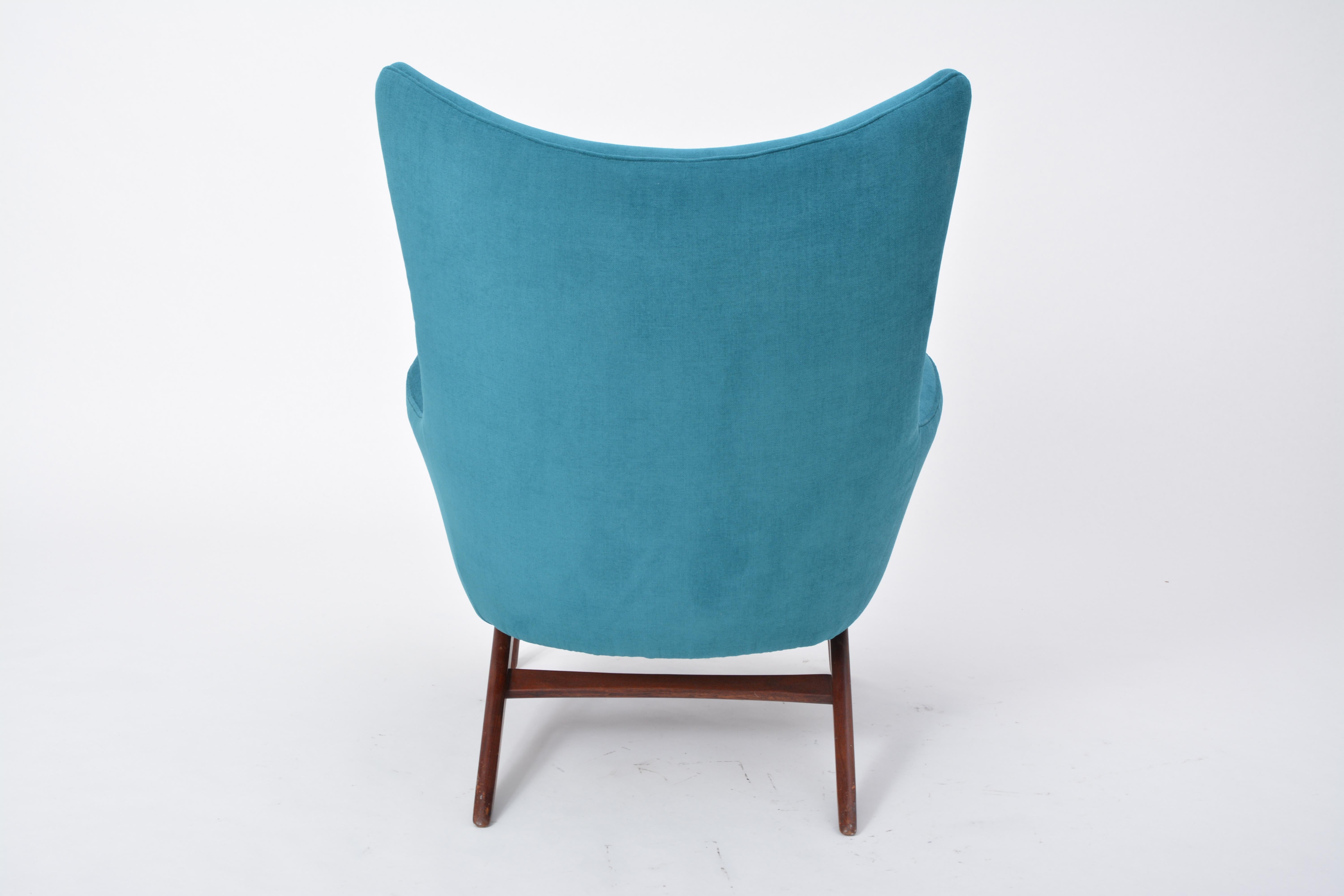 20th Century Reupholstered Danish Mid-Century reclining chair designed by Henry Walter Klein For Sale