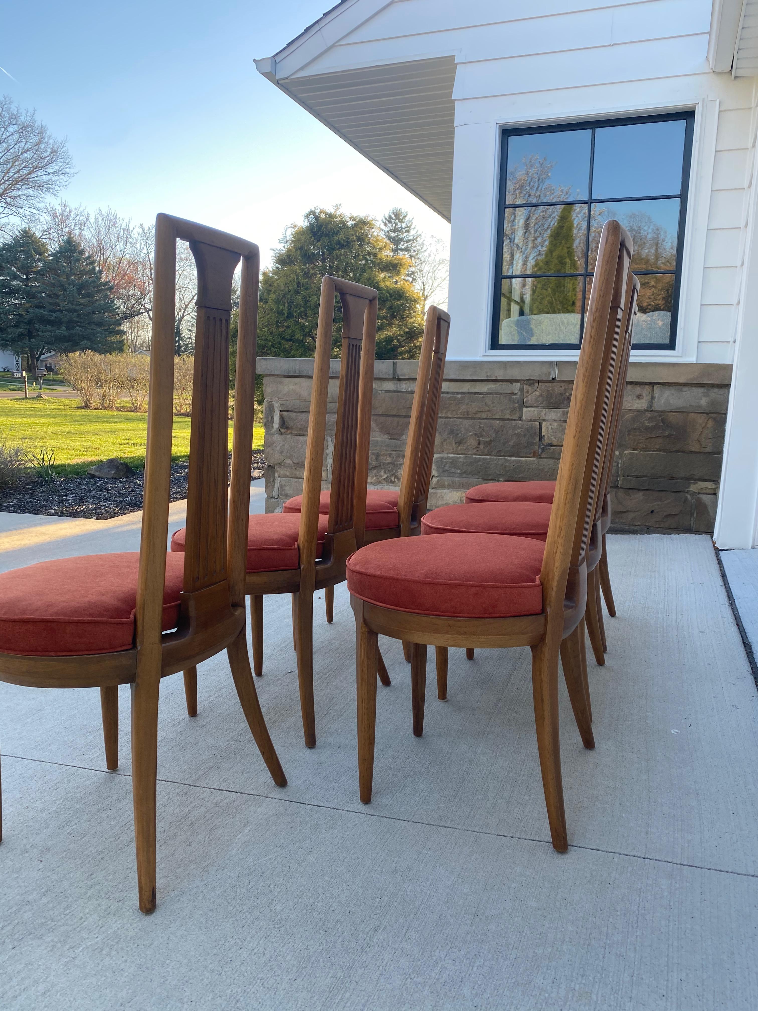 Set of 6 1960s Tomlinson “Sophisticate Collection” No.63 Dining Chairs professionally reupholstered in a gorgeous orange velvet fabric. Tomlinson used this particular model for their advertising of the “Sophisticate Collection”, see picture. Elevate