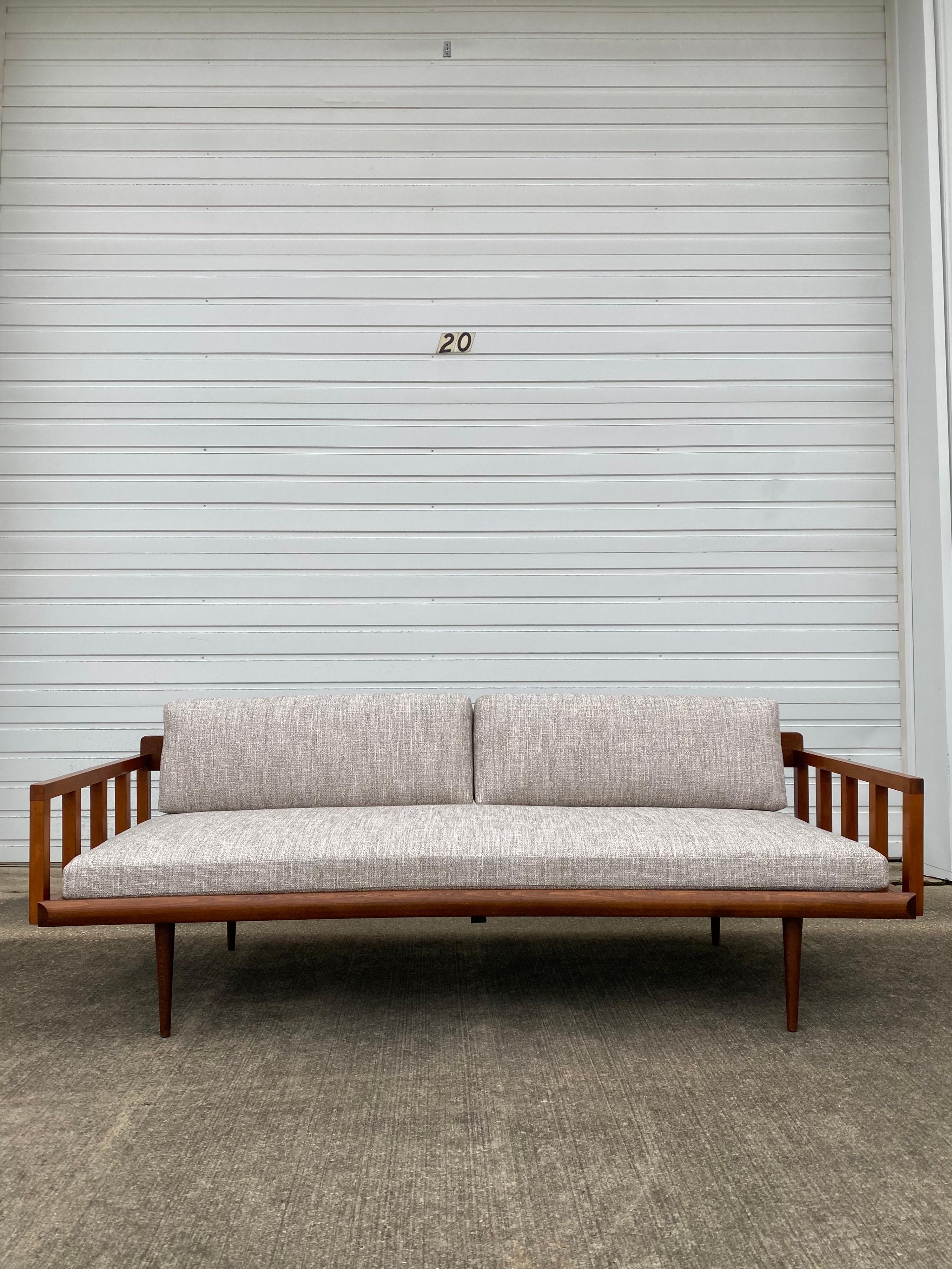 Yugoslavian Mid-century modern teak daybed refinished and reupholstered in a Crypton gray tweed from Greenhouse Fabrics. This piece is in perfect condition and is ready to be an addition to someone’s home.

Additional measurements:

Height without