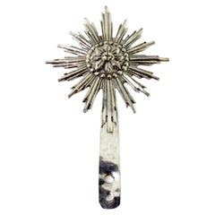 Revealed silver splendor and crowned center