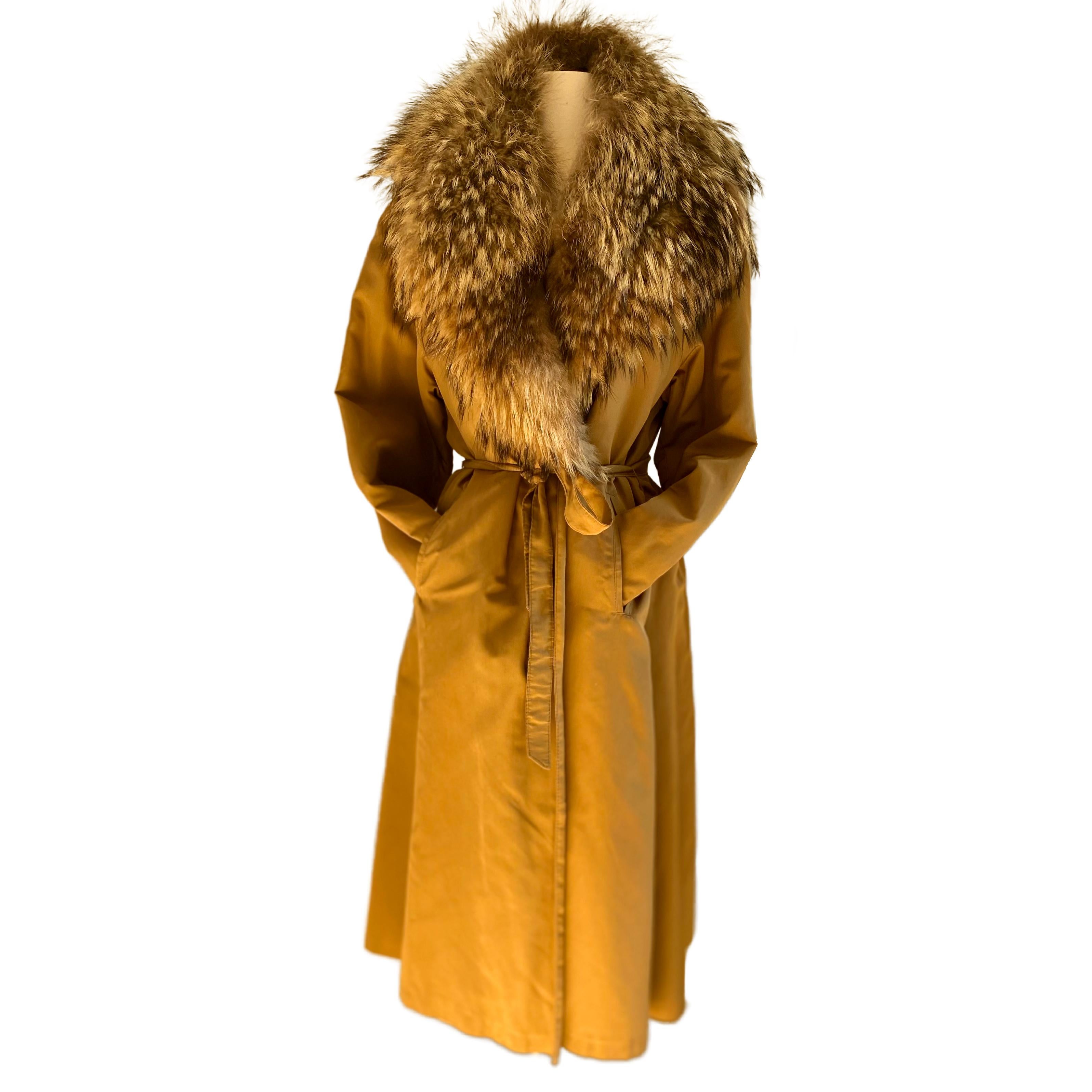 Made in Finland.
A chic, warm, practical, weather-proof (unsure if it is waterproof) coat from a legendary brand.
Collar fur from Finland (fox?)
Lining fur from the US (sheared beaver? sheared mink? Sorry we know little about fur)
Detachable fur