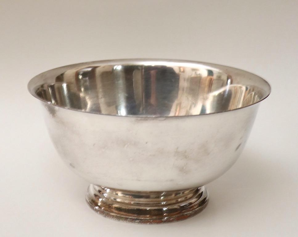 Nice Revere (Reproduction) sterling bowl, model D 261 approximate 26.5 troy oz. This example is in very good condition, free of dents, major scratches etc. Fully and correctly marked on verso:
Paul Revere Reproduction International Sterling D-261.
