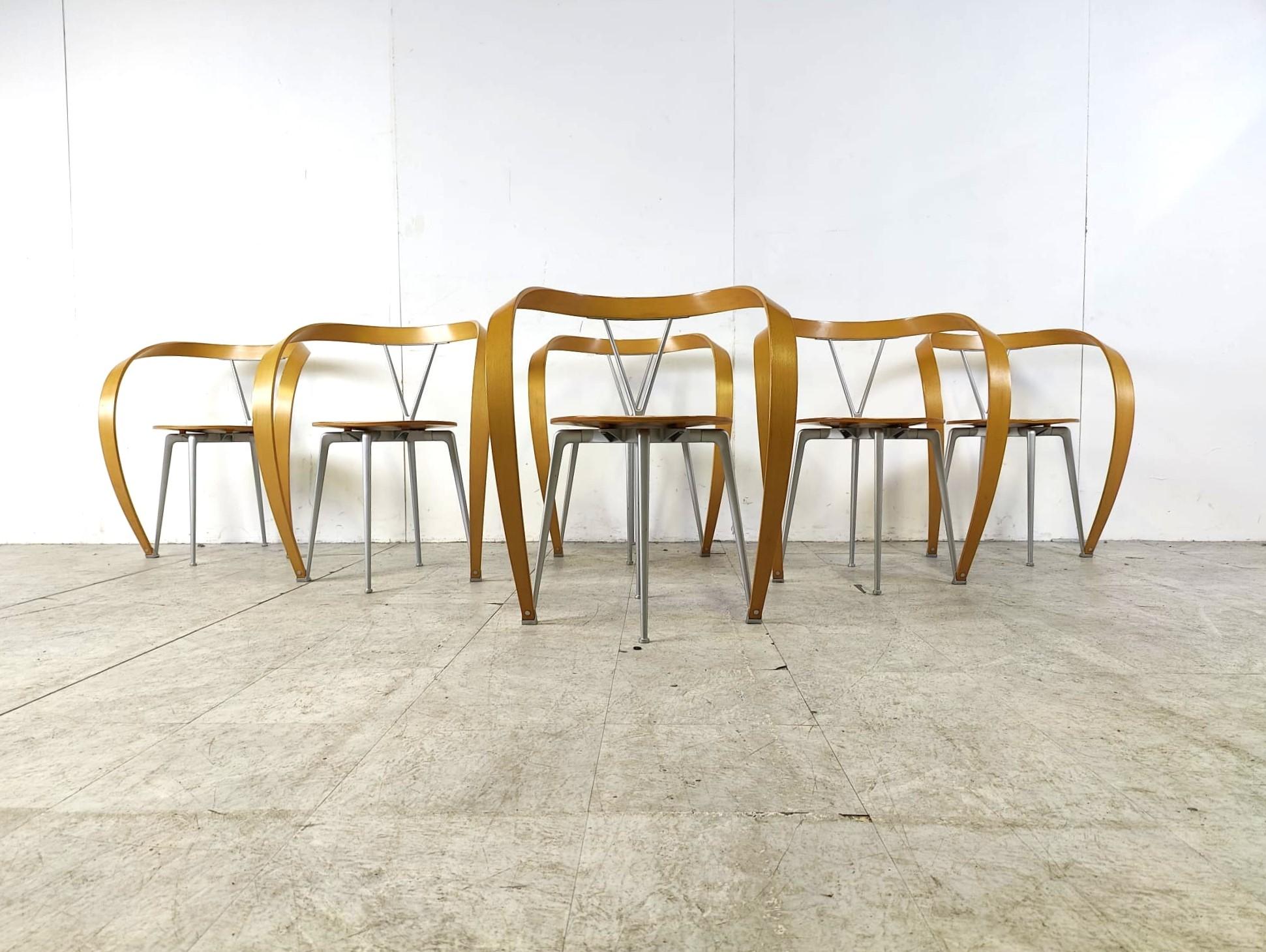 Set of 6 'revers' armchairs or dining chairs.

Striking design by Andrea Branzi and produced by Cassina.

Designed in 1993.

Made from laminated beech wood and grey lacquered metal frame. 

Good condition.

1993- Italy

Dimensions
Height: