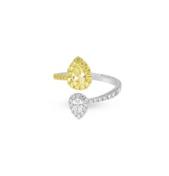 Reverse Bypass Tear Shaped Natural Yellow Diamond Ring