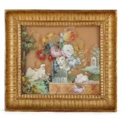 Reverse glass floral paintings in giltwood frames