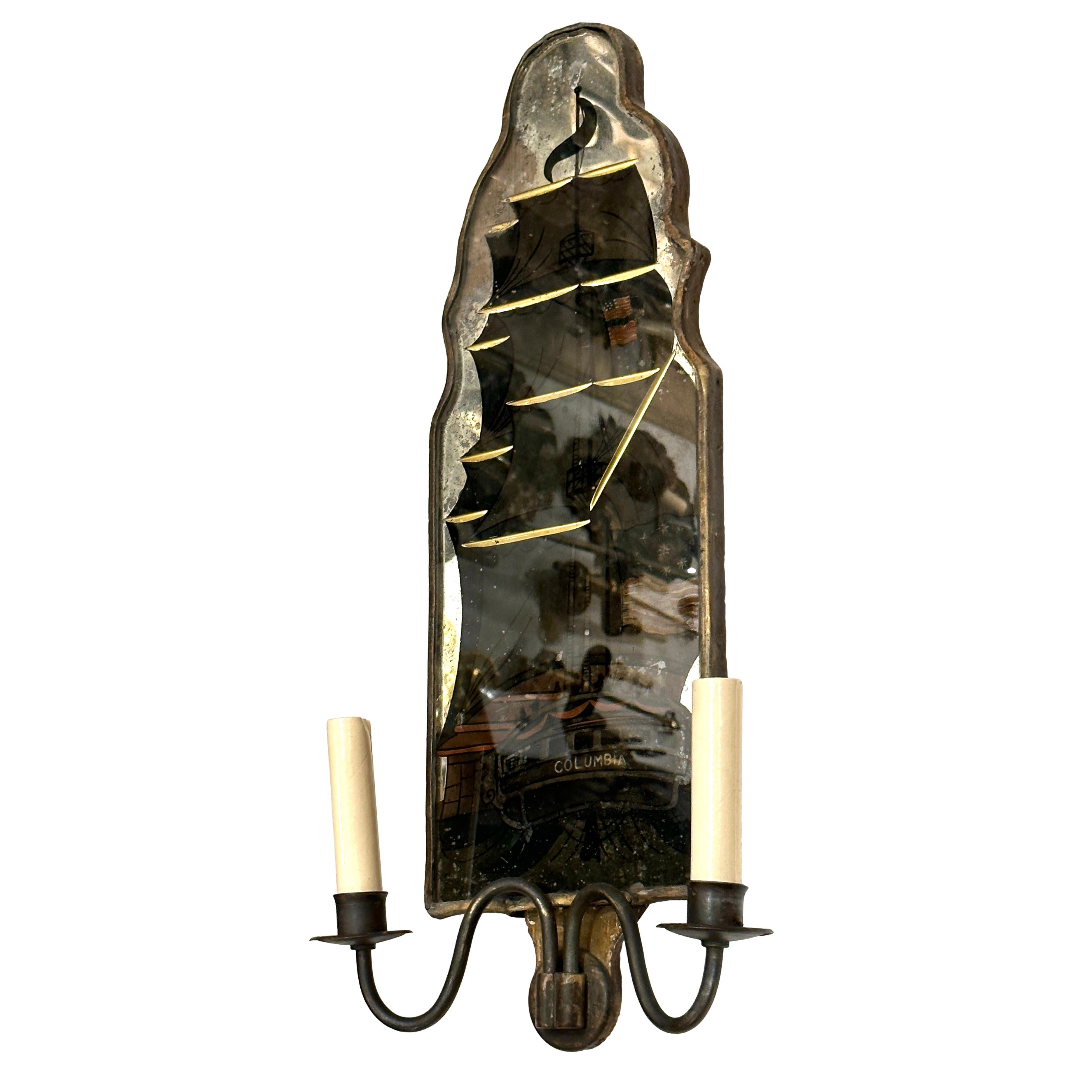 A pair of circa 1920’s American mirrored sconces with etched and reverse painted ships.

Measurements:
Height: 21.75″
width: 10″ (widest point from arm to arm)
Depth: 5″