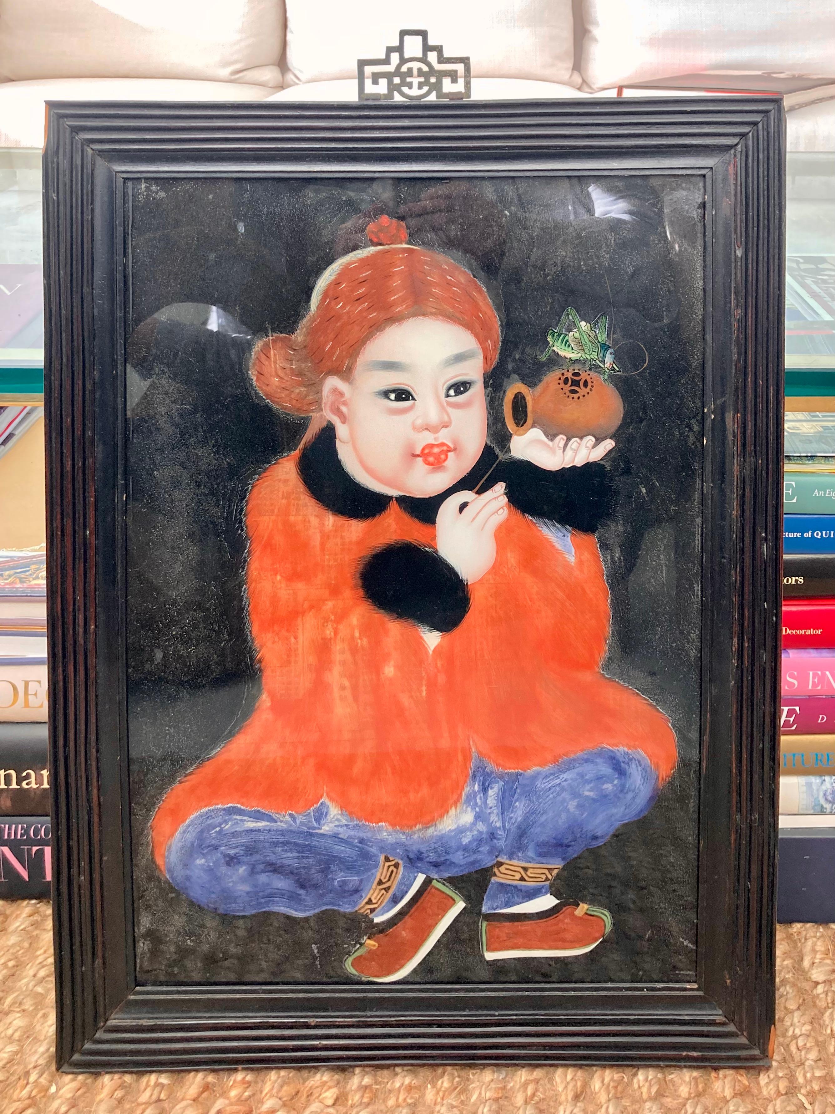 Beautiful reverse painting on glass of young Asian boy. Very rare and also rare subject matter. Very cute boy image. This is 19th Century. Great colors.