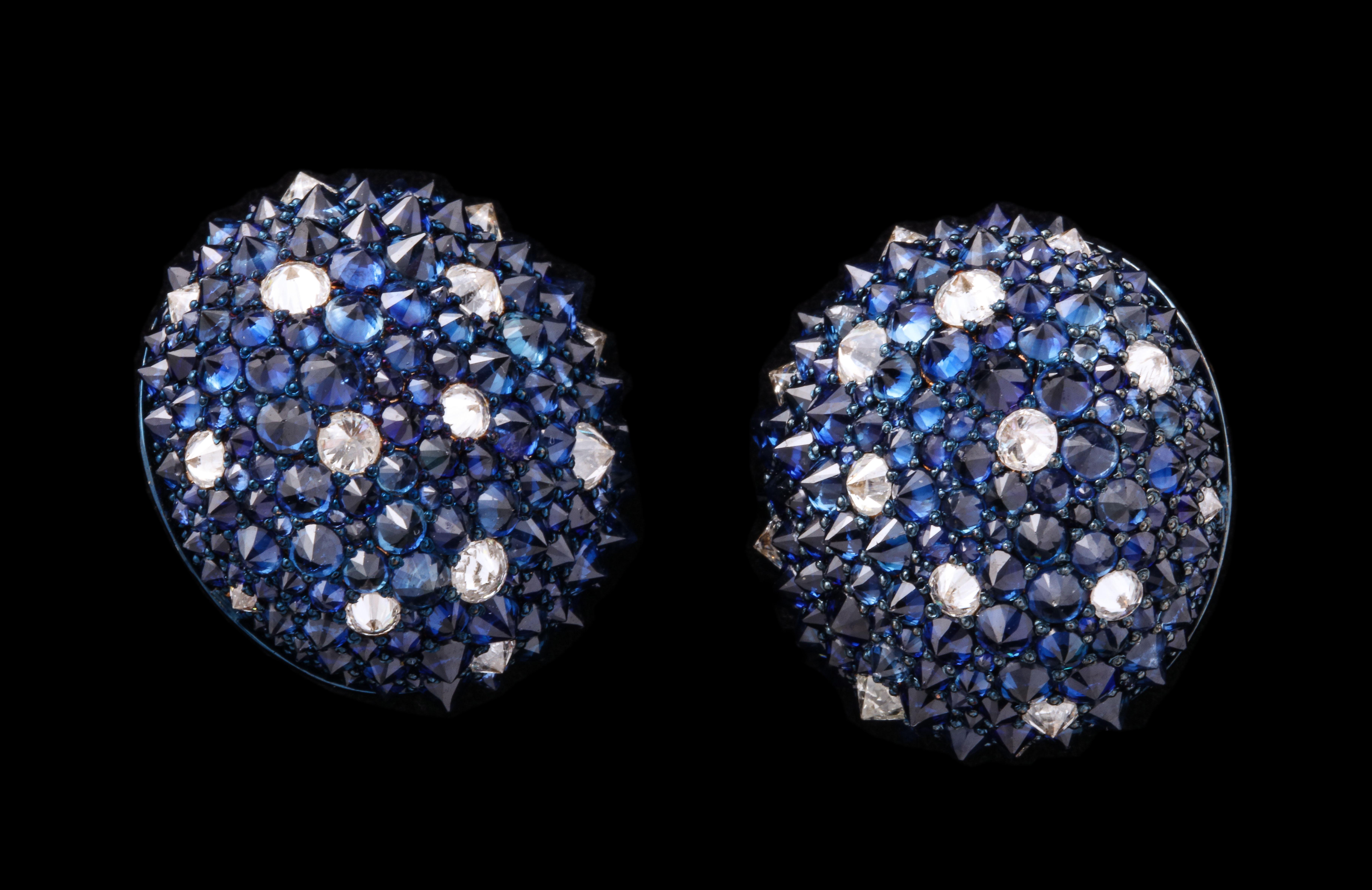 Reverse set sapphire and Diamond Earrings.
10.73 ct diamonds
21.31 ct sapphires

18 karat gold
