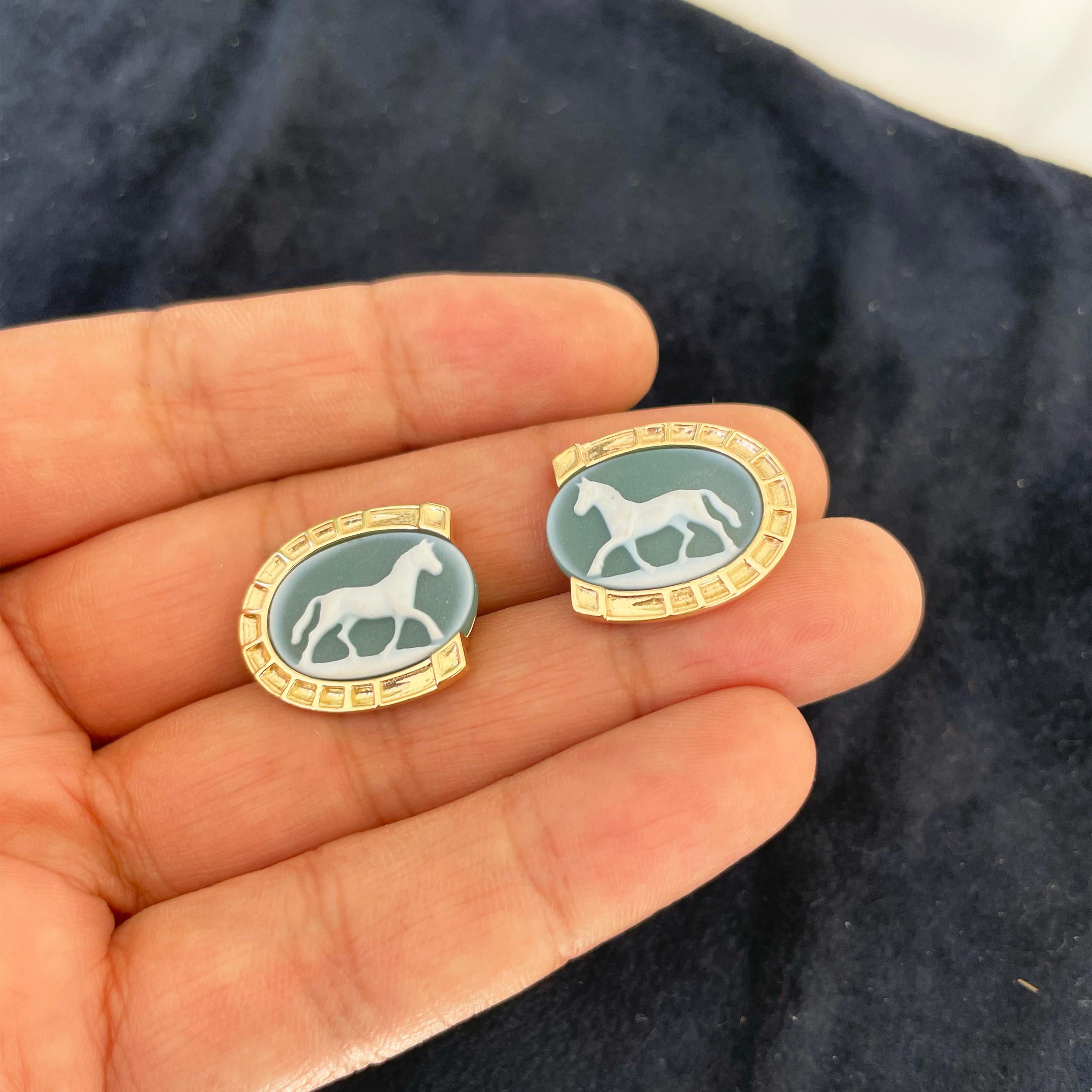 Reversible 14 karat gold horse carving cameo horse-shoe onyx cufflinks.

These exquisite pair of contemporary horse agate cameo carved cufflinks with horse shoe collet in 14 karat gold is a delight for the wearer! Hand-carved in the relief of a
