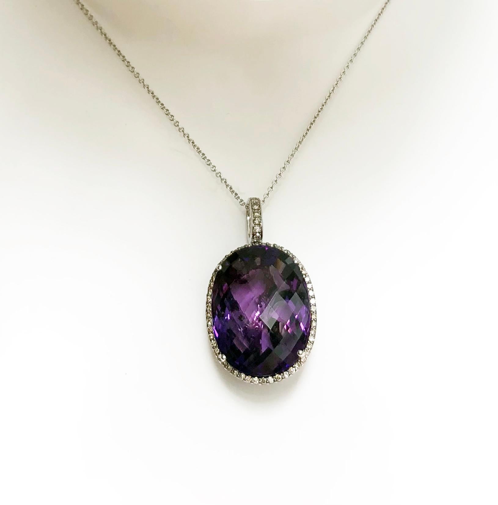 Amethyst 32.29 carats with Brown Diamond 1.26 carats Pendant set in 18 Karat White Gold Settings
(chain not included)

Width:  2.1 cm 
Length: 3.6 cm
Total Weight: 12.19 grams

