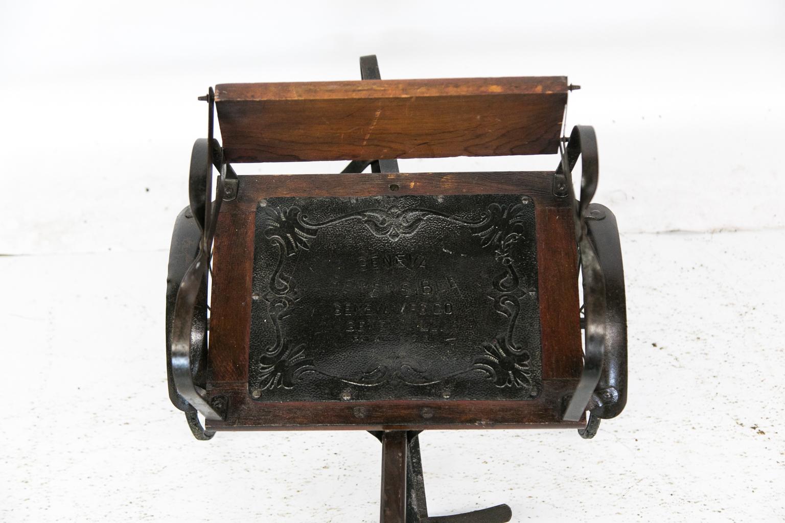 Reversible baby cart was made by Geneva Manufacturing Company in Geneva, Illinois, patented December 6, 1910. It has a leather seat that is embossed with pressed leather floral designs, as well as the maker’s name and date. The arms and footrest are