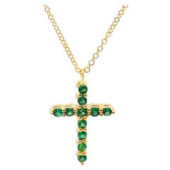 Collana con croce reversibile di smeraldi e diamanti in oro giallo 18 carati