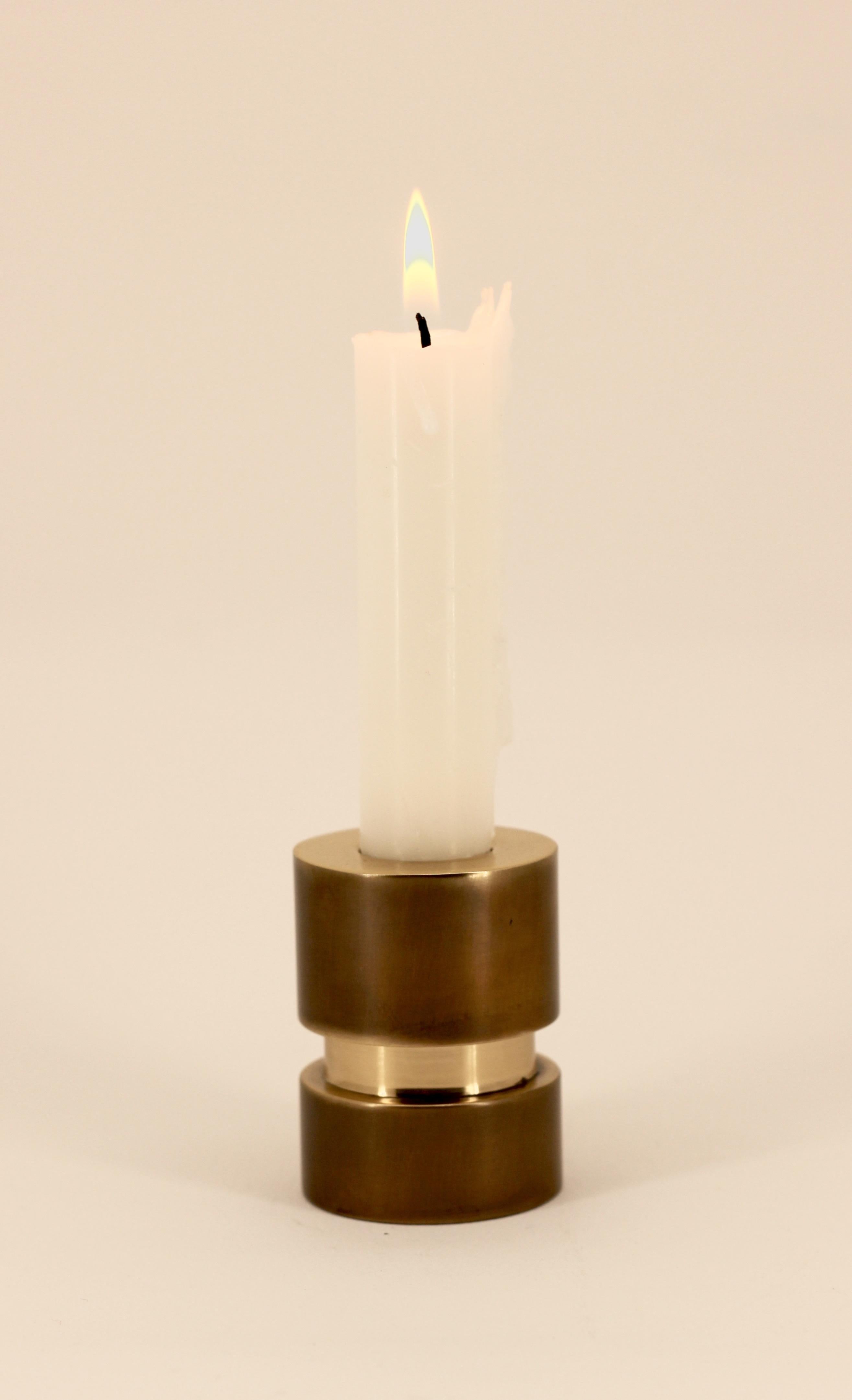 Ingenious and very charming reversible handmade cast brass candle / tea-light holder. Just reverse the piece whether you wish to use it to hold a candle or a tea-light.

Solid brass and cast using very traditional techniques, the piece is finished