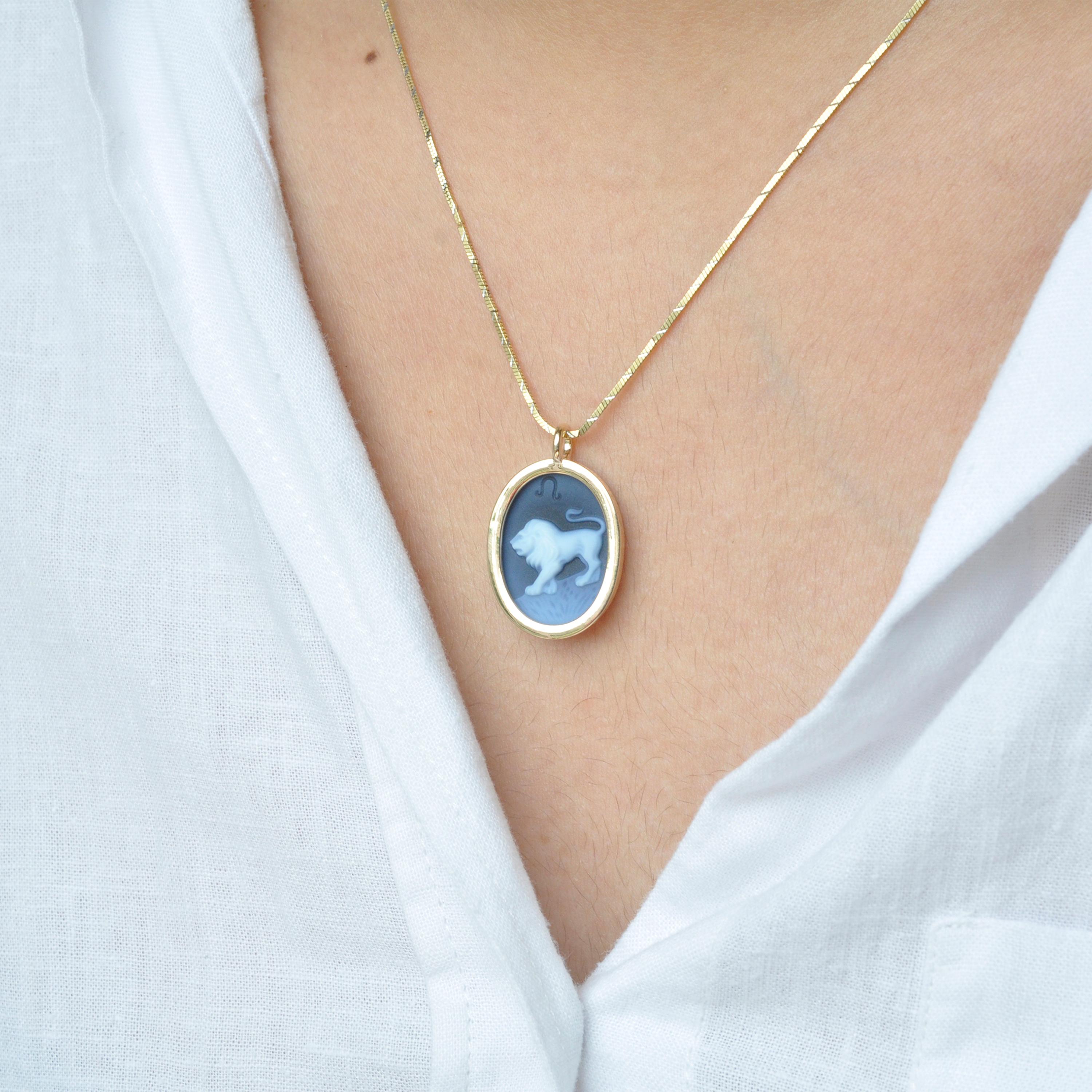 The reversible pendant necklace featuring a Leo sun sign carving cameo zodiac diamond in 14 karat gold is a remarkable piece of jewelry that combines elegance, craftsmanship, and personalization. It offers two distinct looks in one, allowing you to