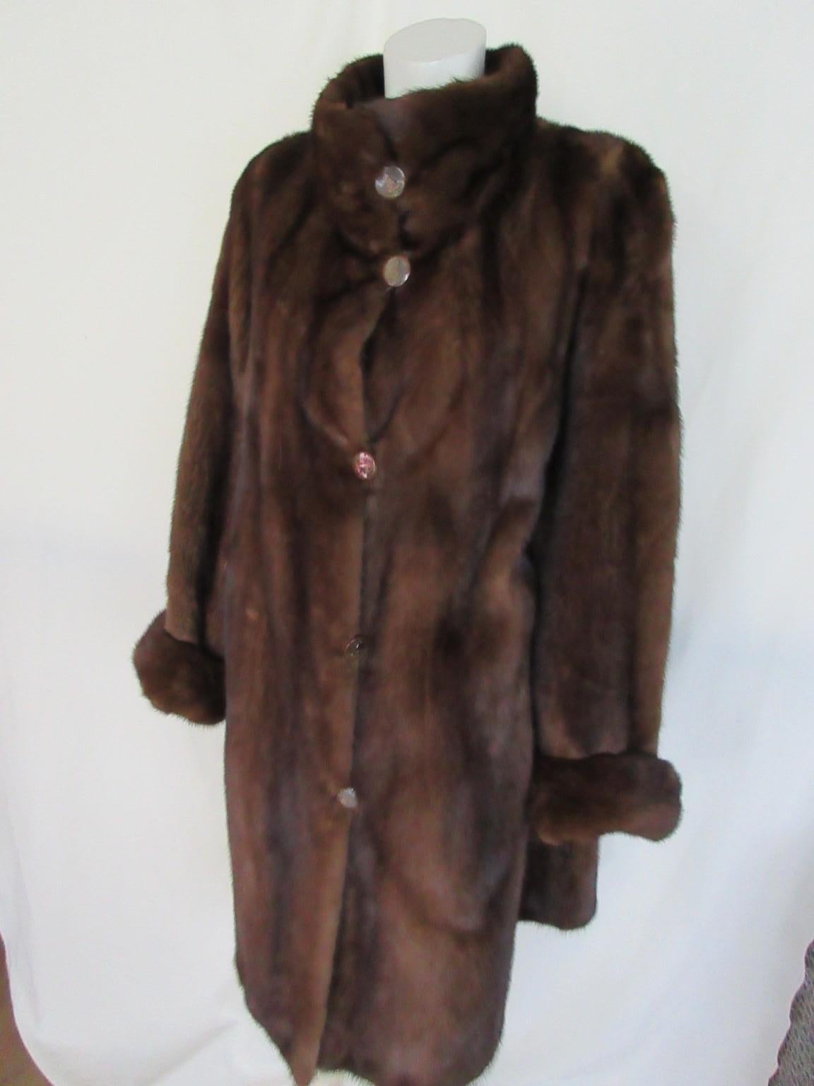 This quality mink fur coat can be worn at both sides, reversible

We offer more exclusive fur items, view our frontstore

Details:
With 2 velvet pockets at the fur side and 2 pockets at the silk side and 5 closing buttons at each side
Mink fur is