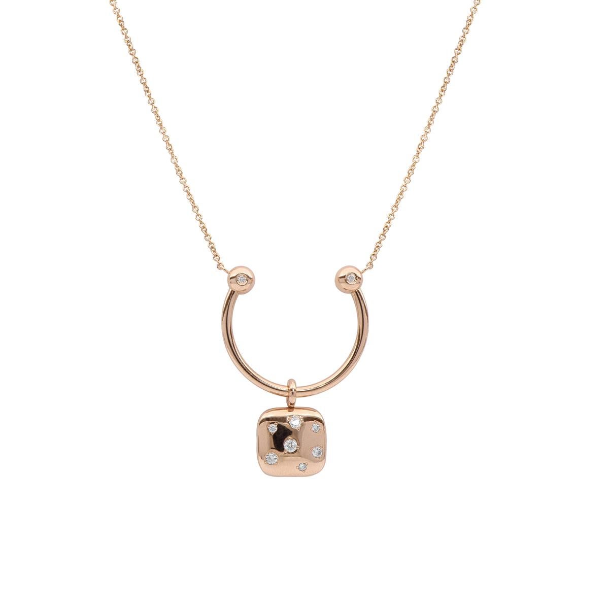 This unique, modern necklace is handcrafted in 18 Kt rose gold. The fine chain holds an original U-shaped design featuring two white brilliant-cut diamond accents. A reversible square pendant dangles from the center showcasing a semi-precious purple